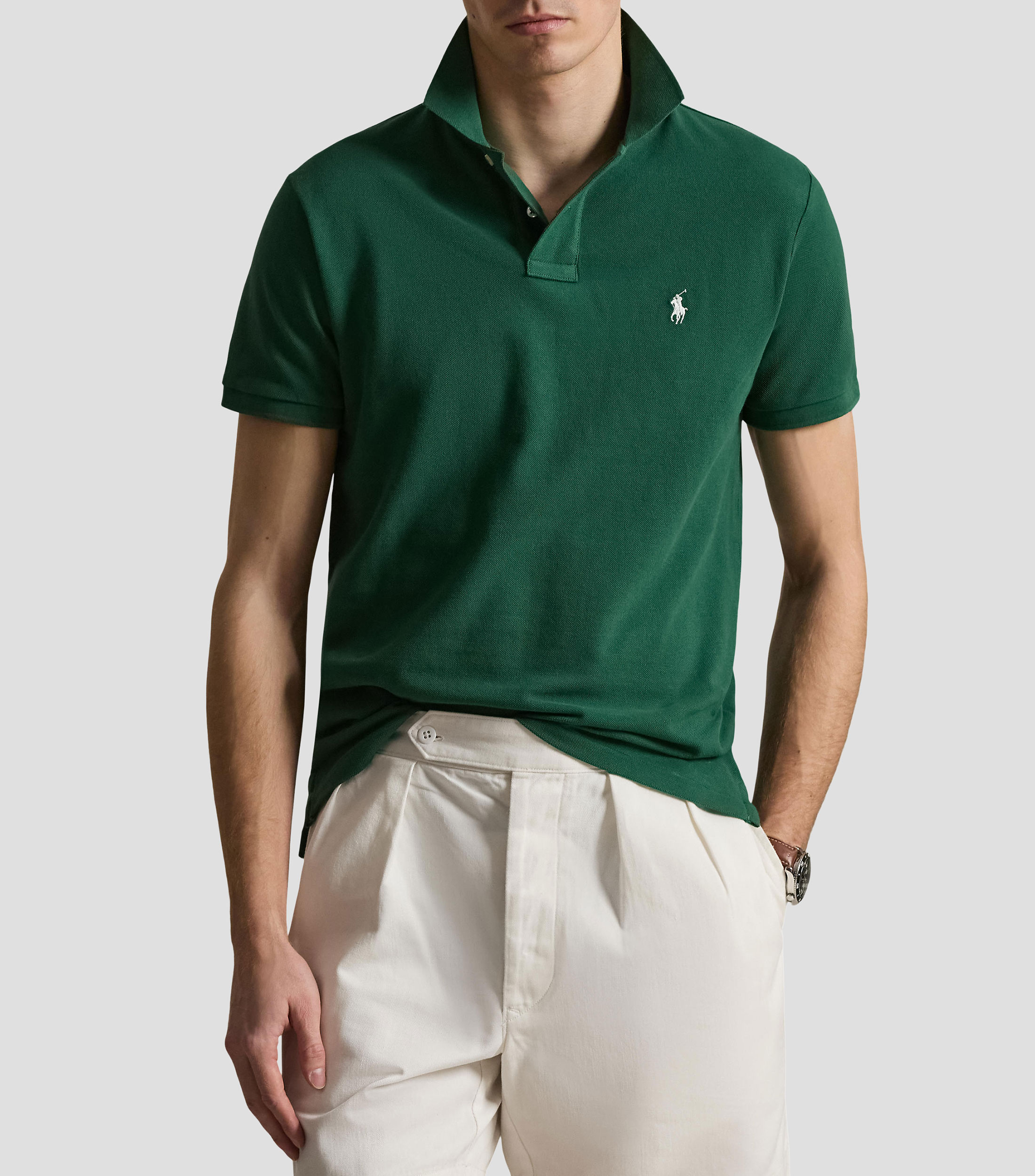 Playera tipo polo con manga corta lisa Hombre