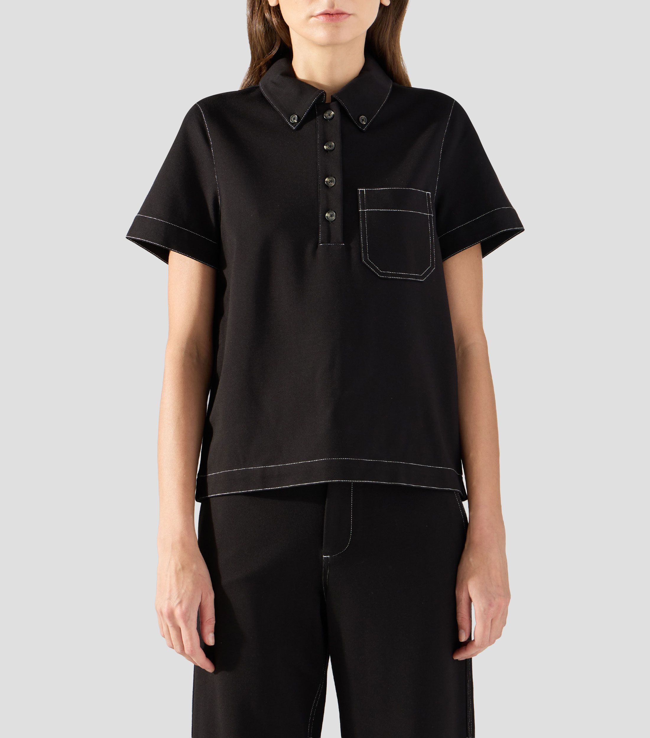 Playera tipo polo manga corta lisa Mujer