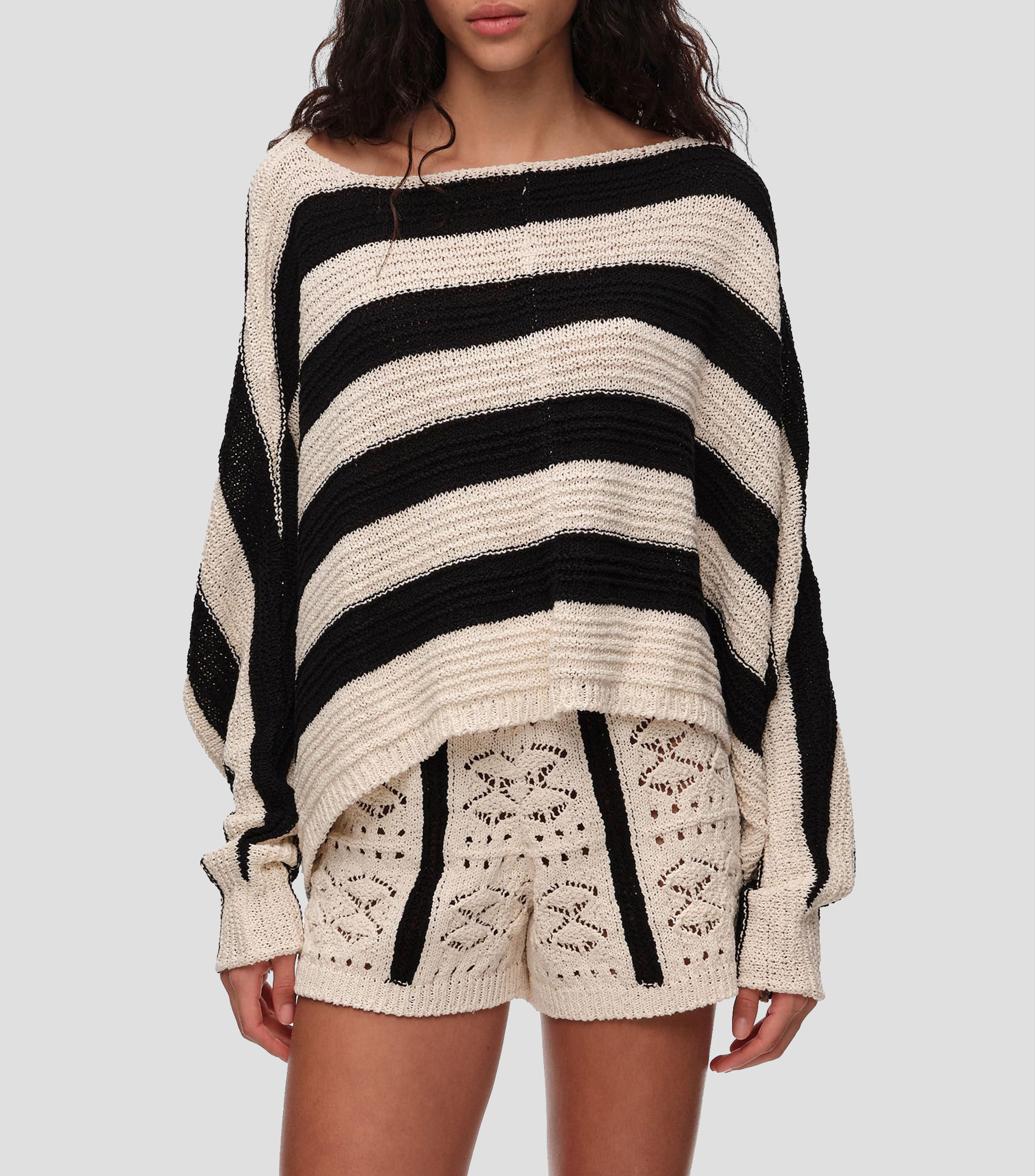 Suéter oversized corto rayas negras Mujer