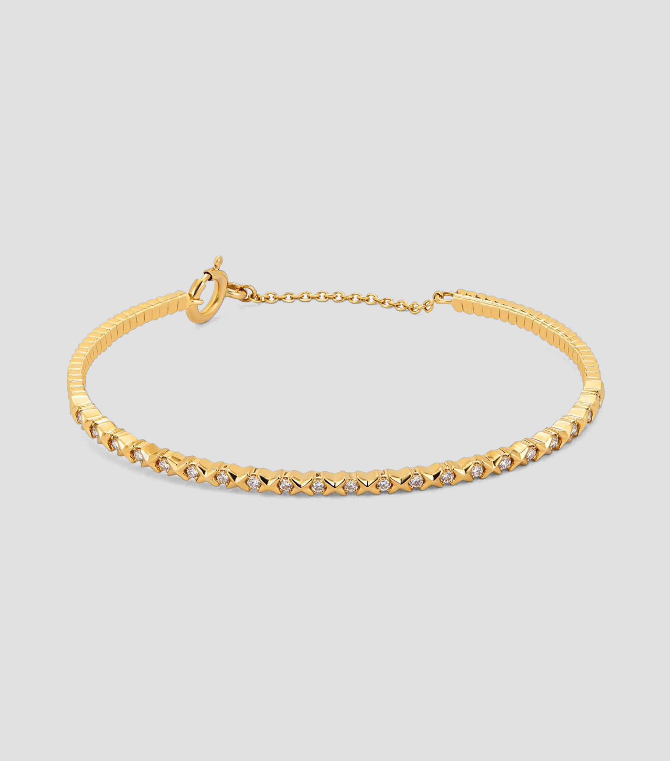 Brazalete rígido en Oro amarillo de 18 Kilates con diamantes Mujer