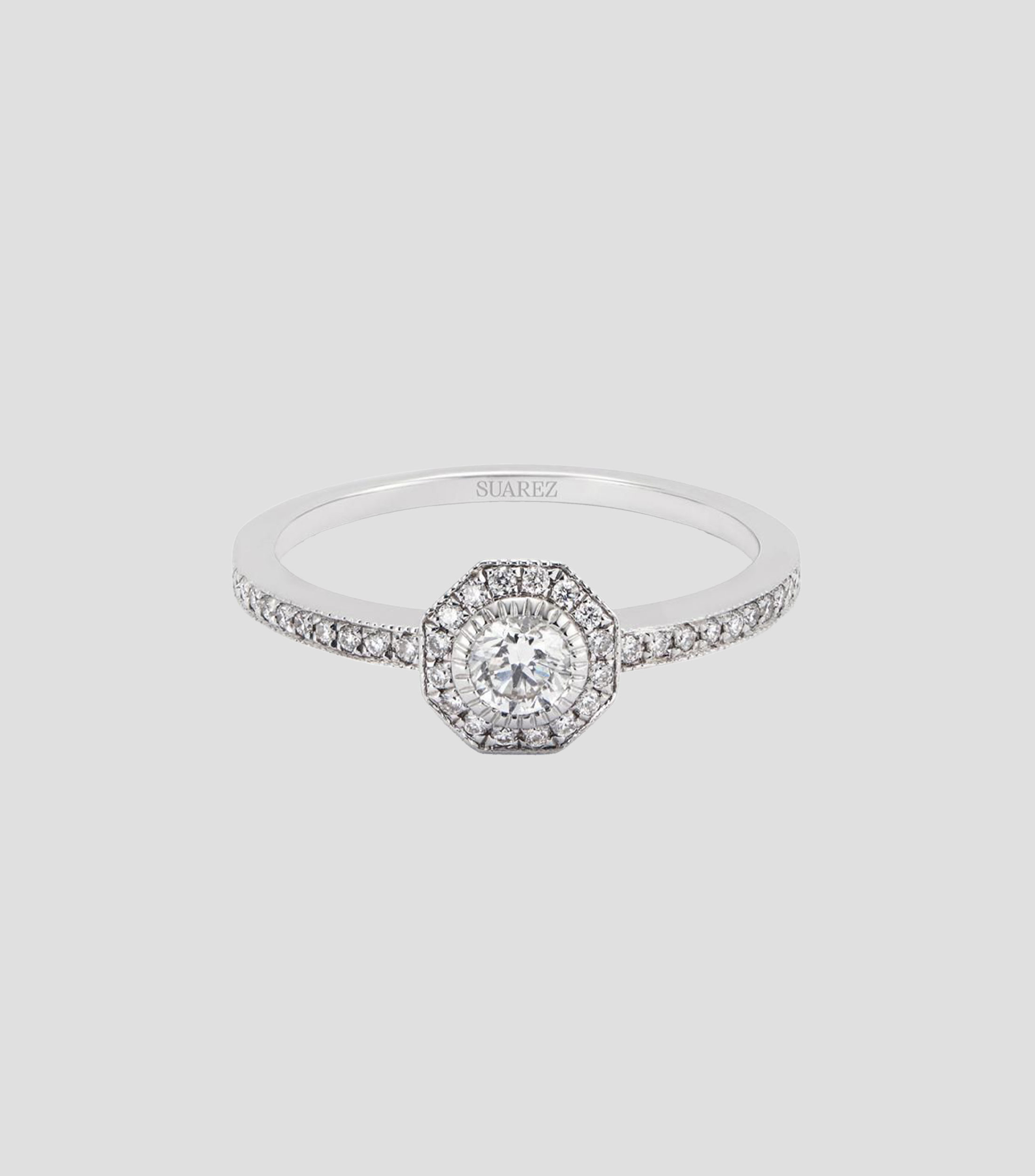 Anillo solitario de compromiso en Oro blanco de 18 Kilates con orla de diamantes Mujer