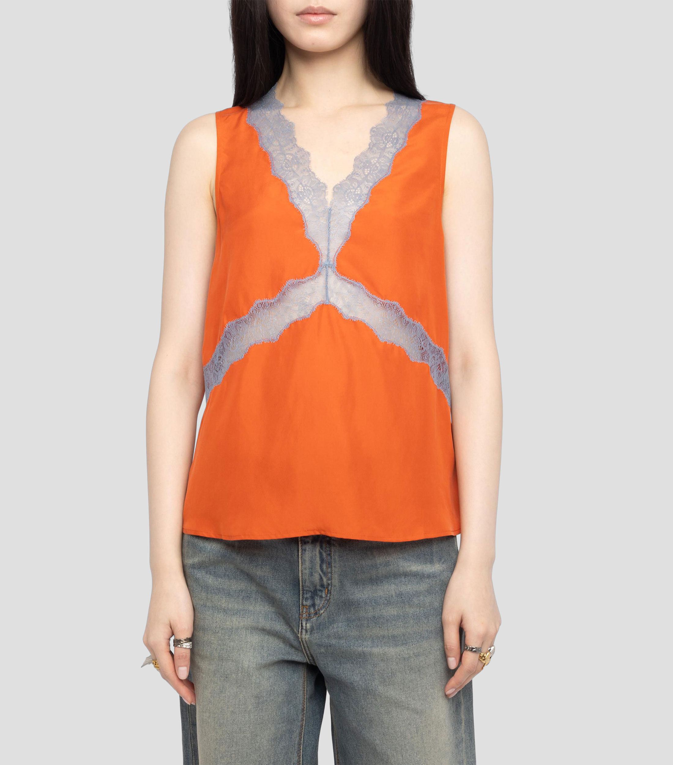 Blusa lisa sin mangas Mujer