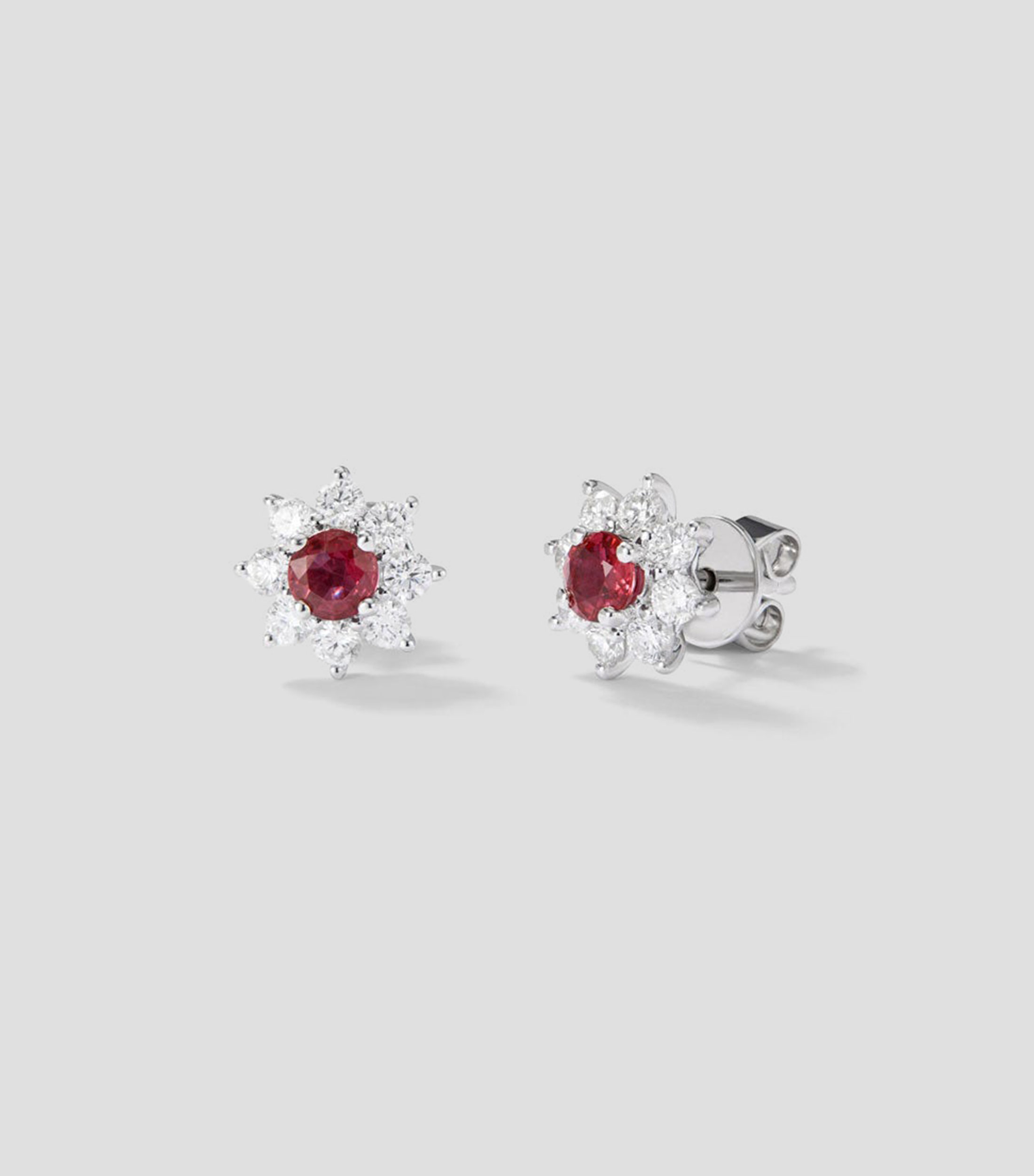 Aretes en oro de 18 kilates flor Mujer