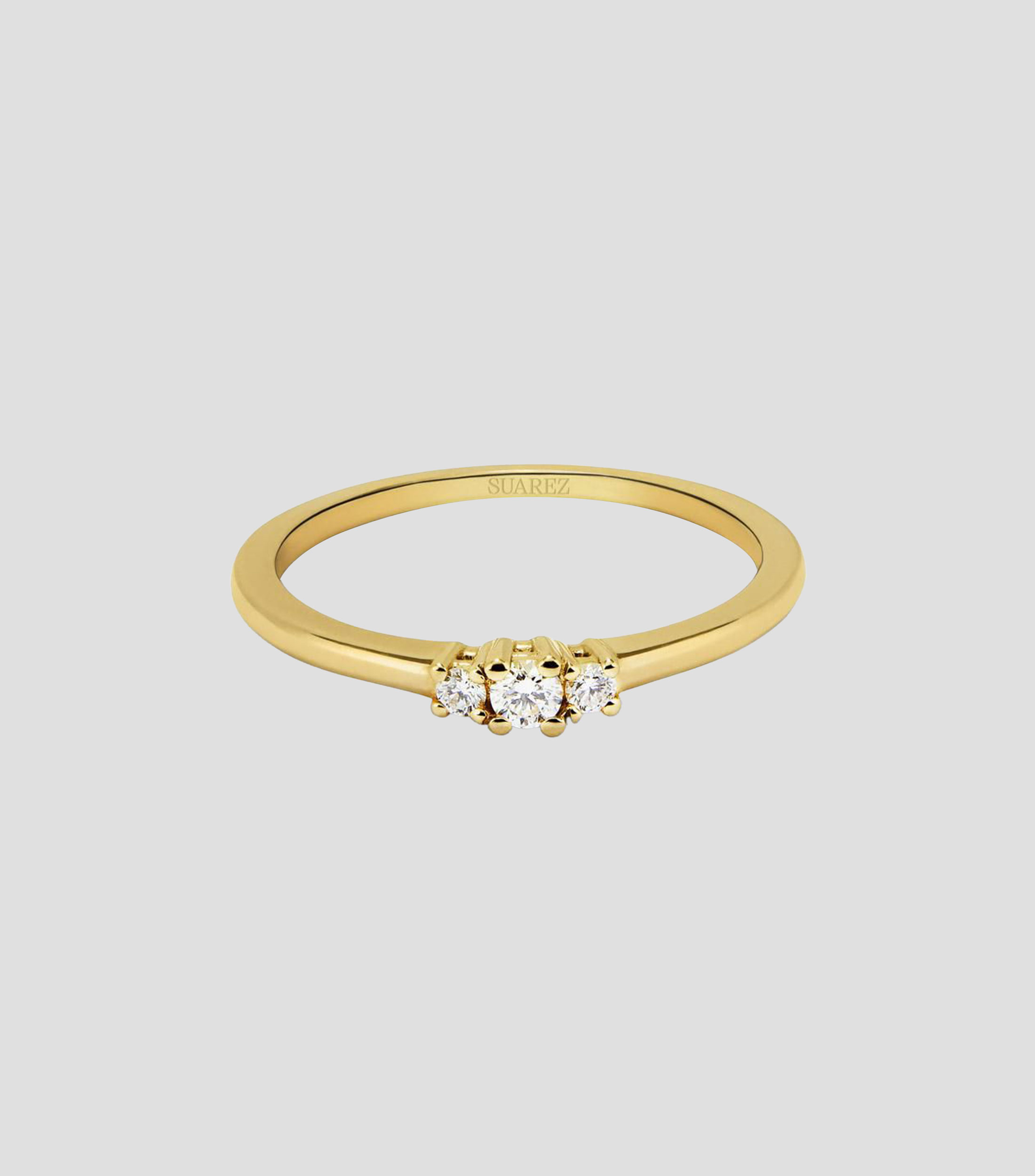 Anillo tresillo en Oro amarillo de 18 Kilates Orion con diamantes Mujer