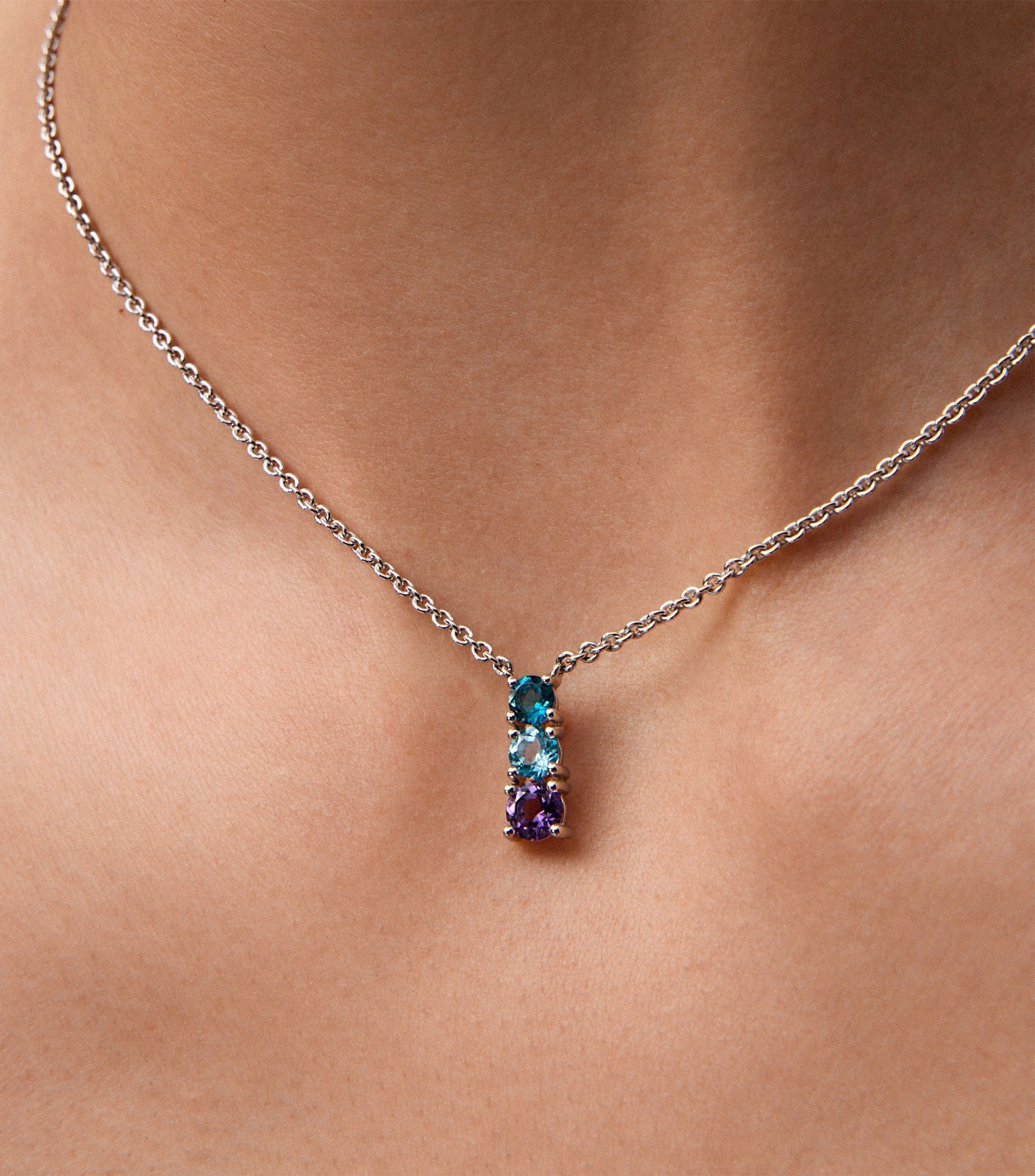 Colgante de plata 925 con topacio azul london, topacio azul swiss y amatista morada en talla brillante