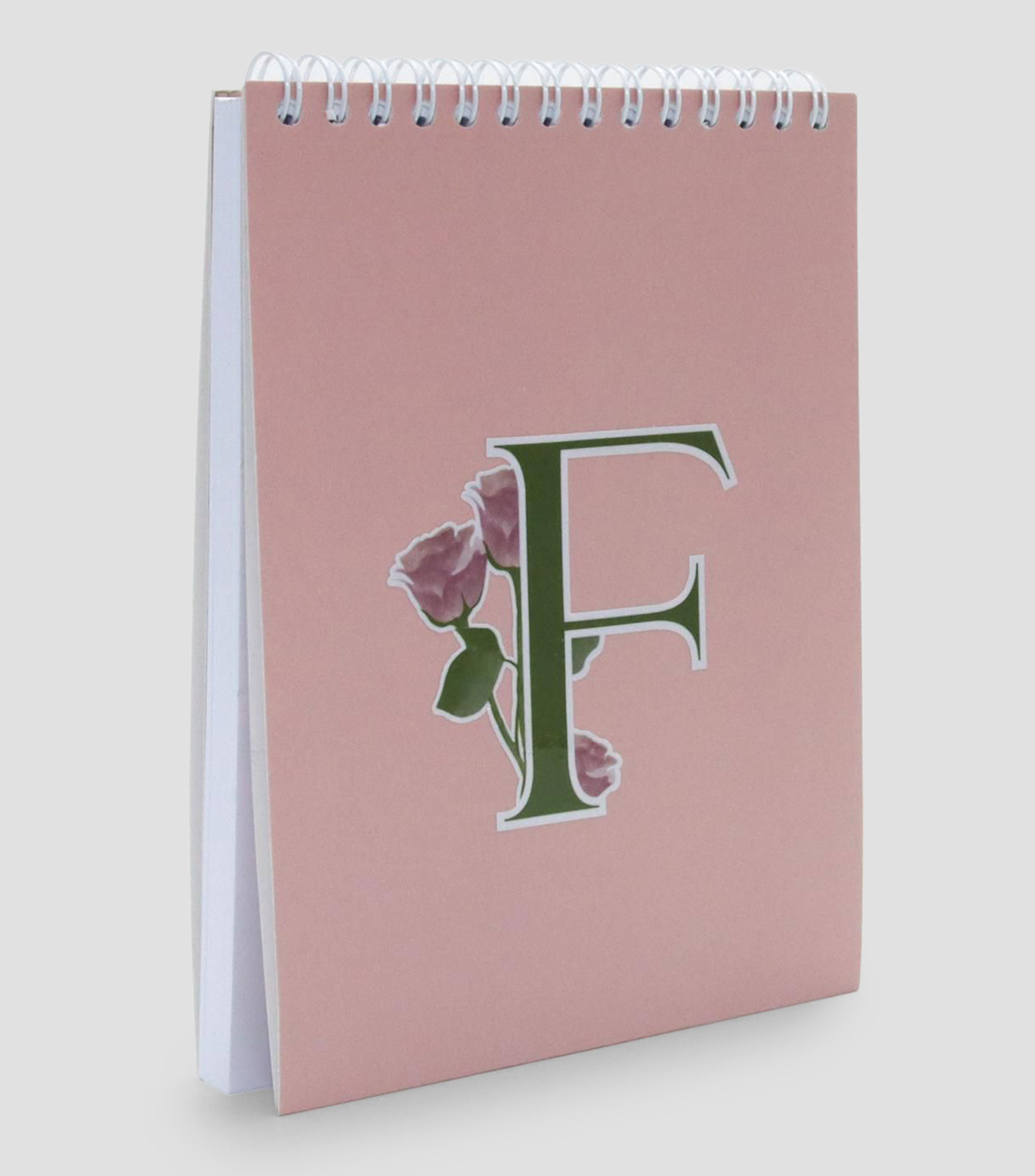 Libreta mediana inicial "F", hojas raya