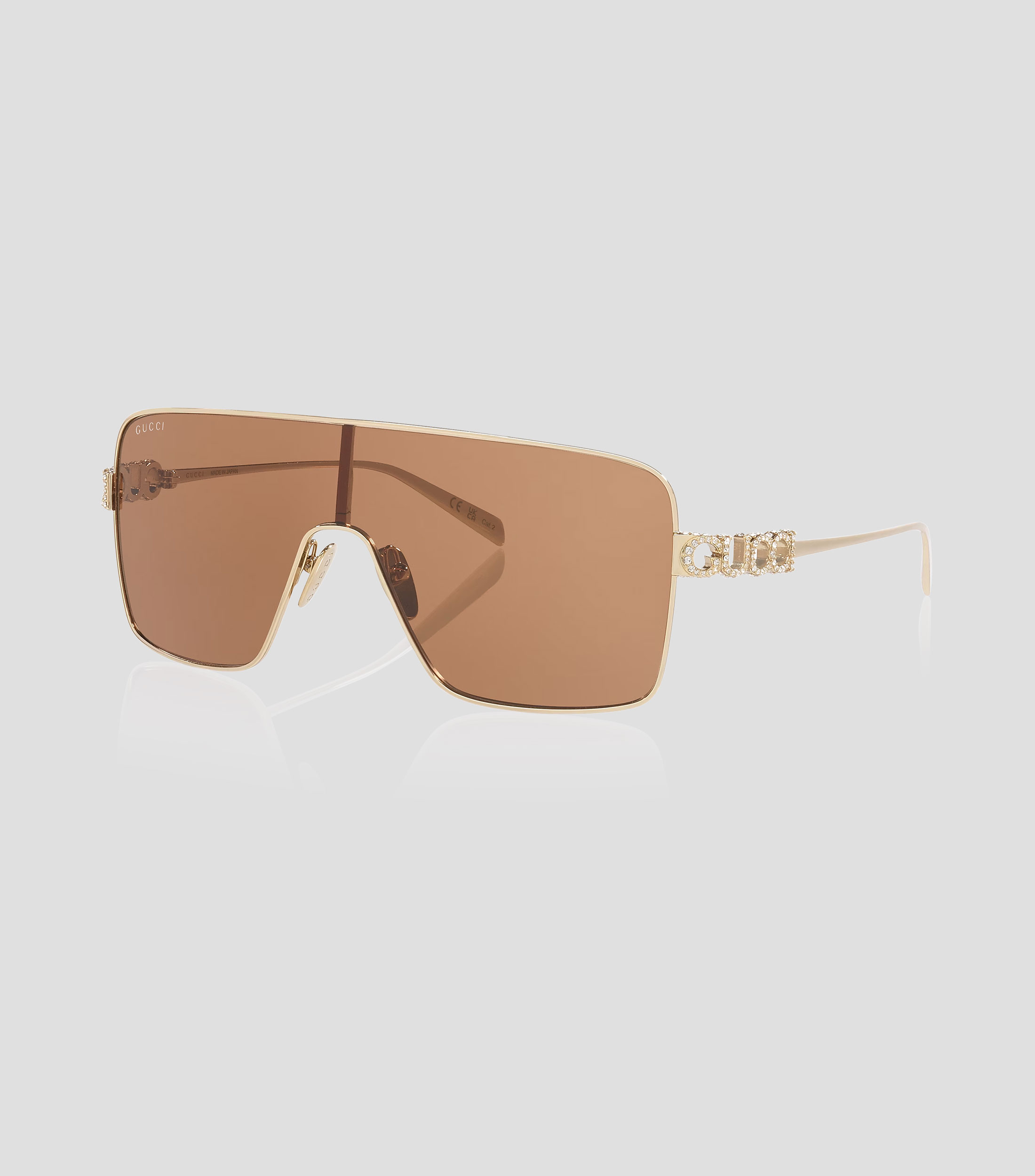 Lentes de sol irregulares dorados Mujer