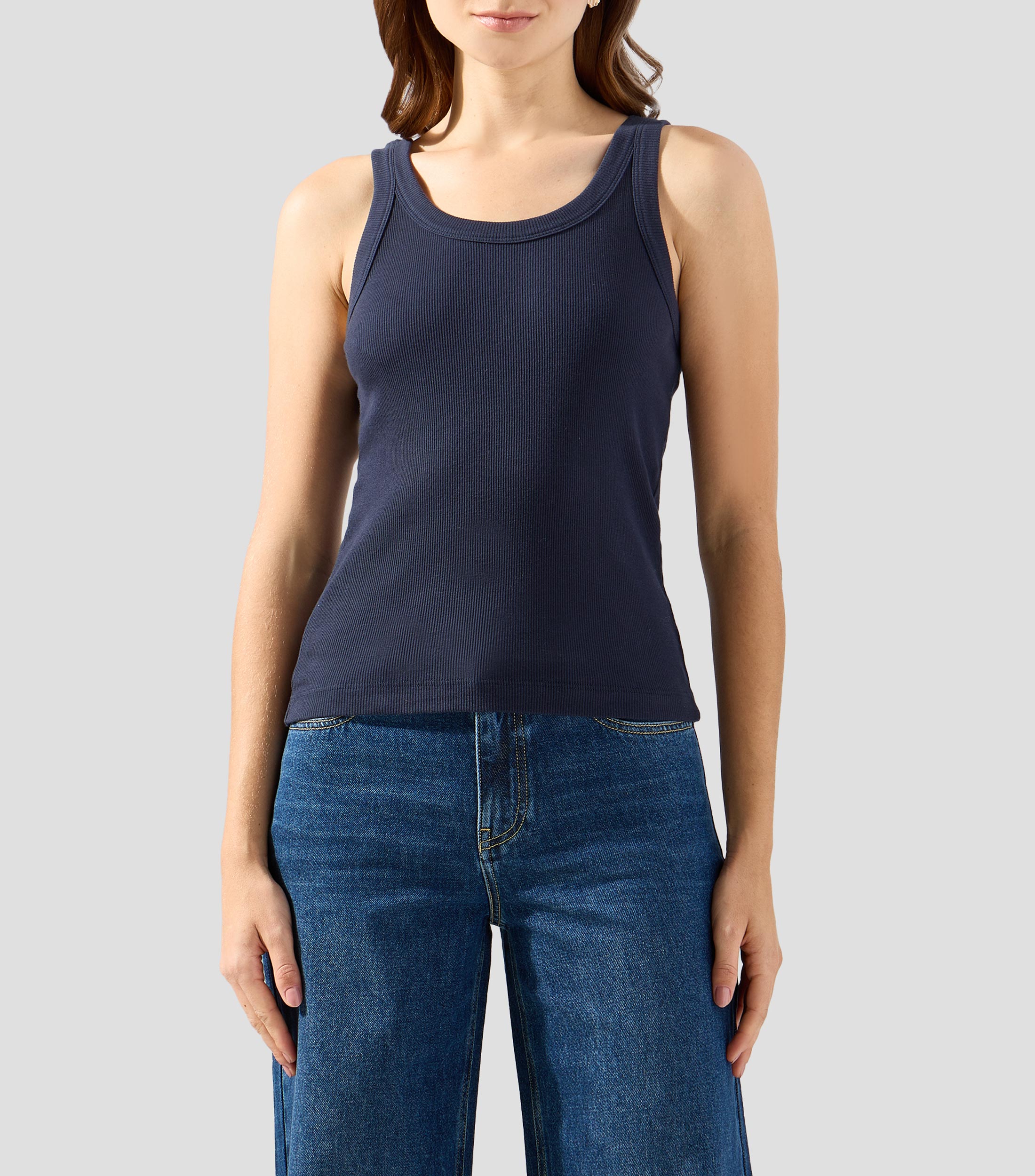 Blusa lisa sin mangas Mujer