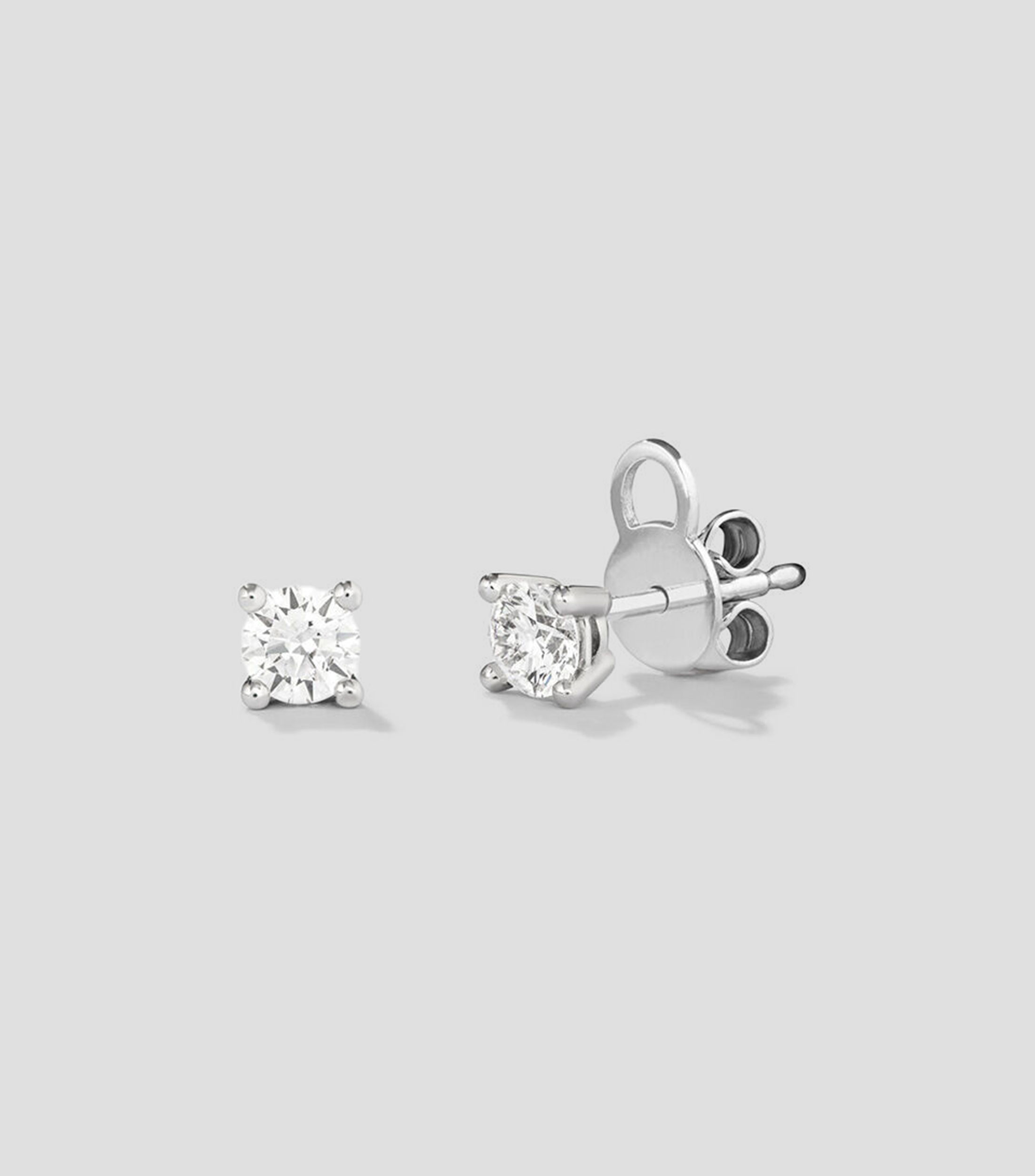 Aretes en oro de 18 kilates con diamante Mujer