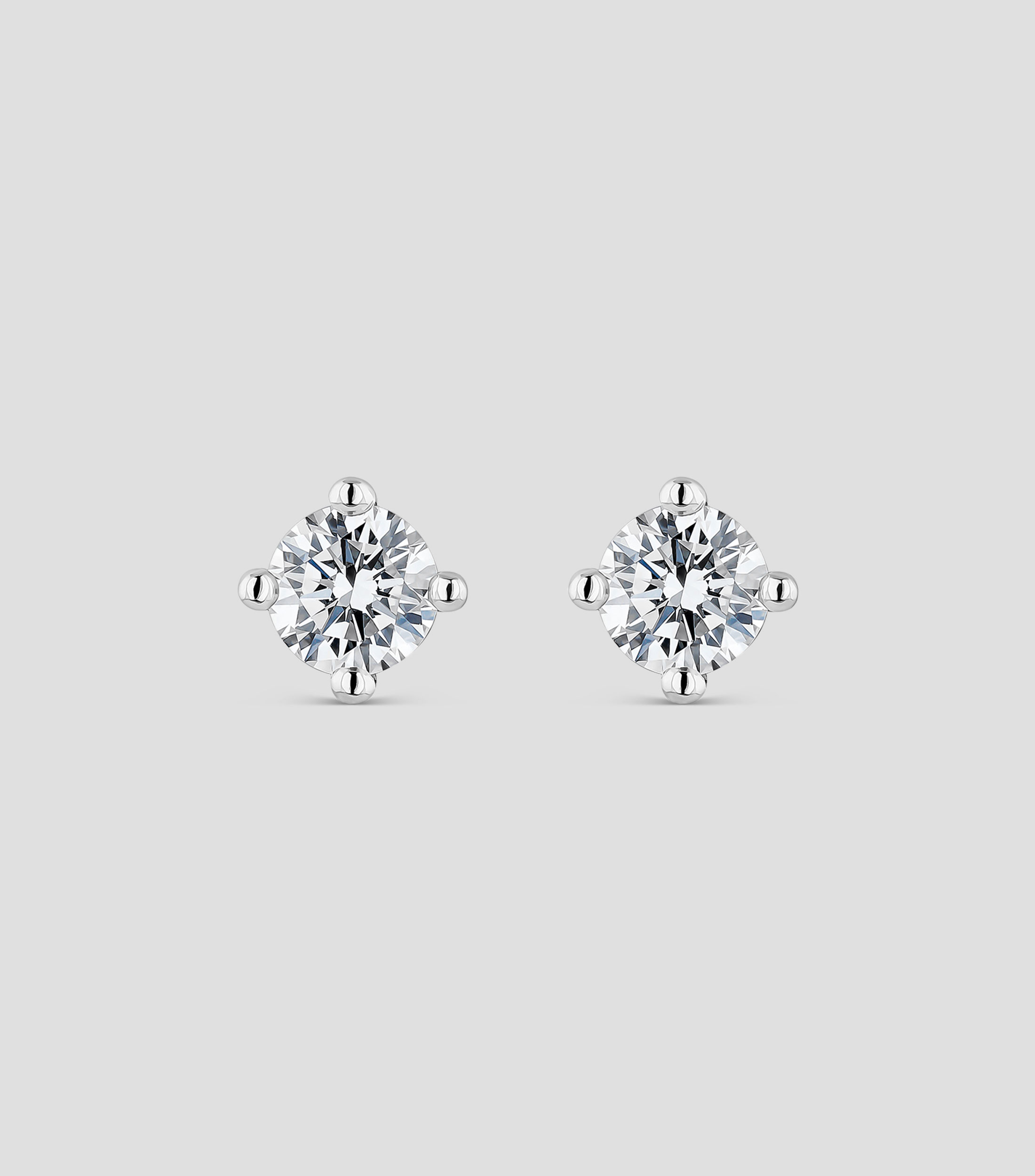 Aretes en oro de 18 Kts con diamantes Mujer