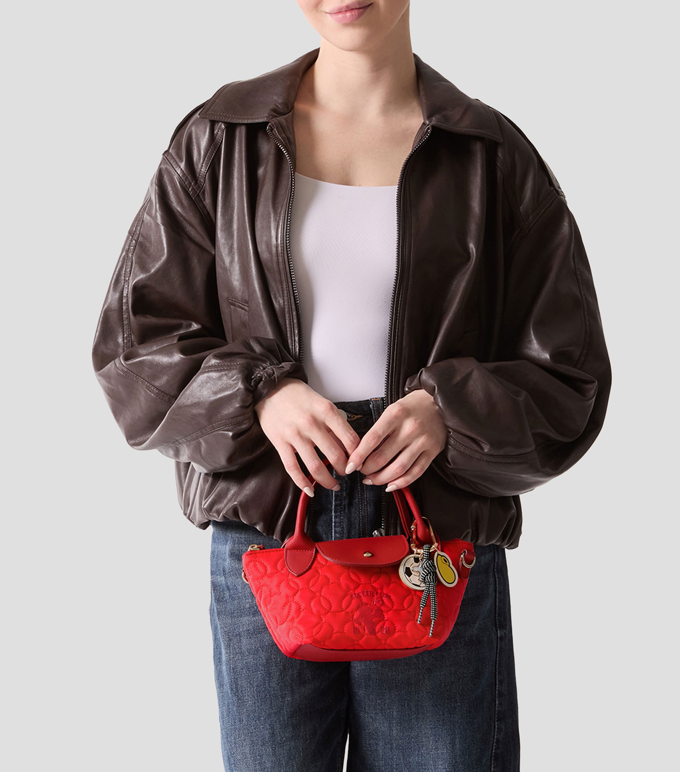 Bolsa crossbody lisa con pespuntes Niña