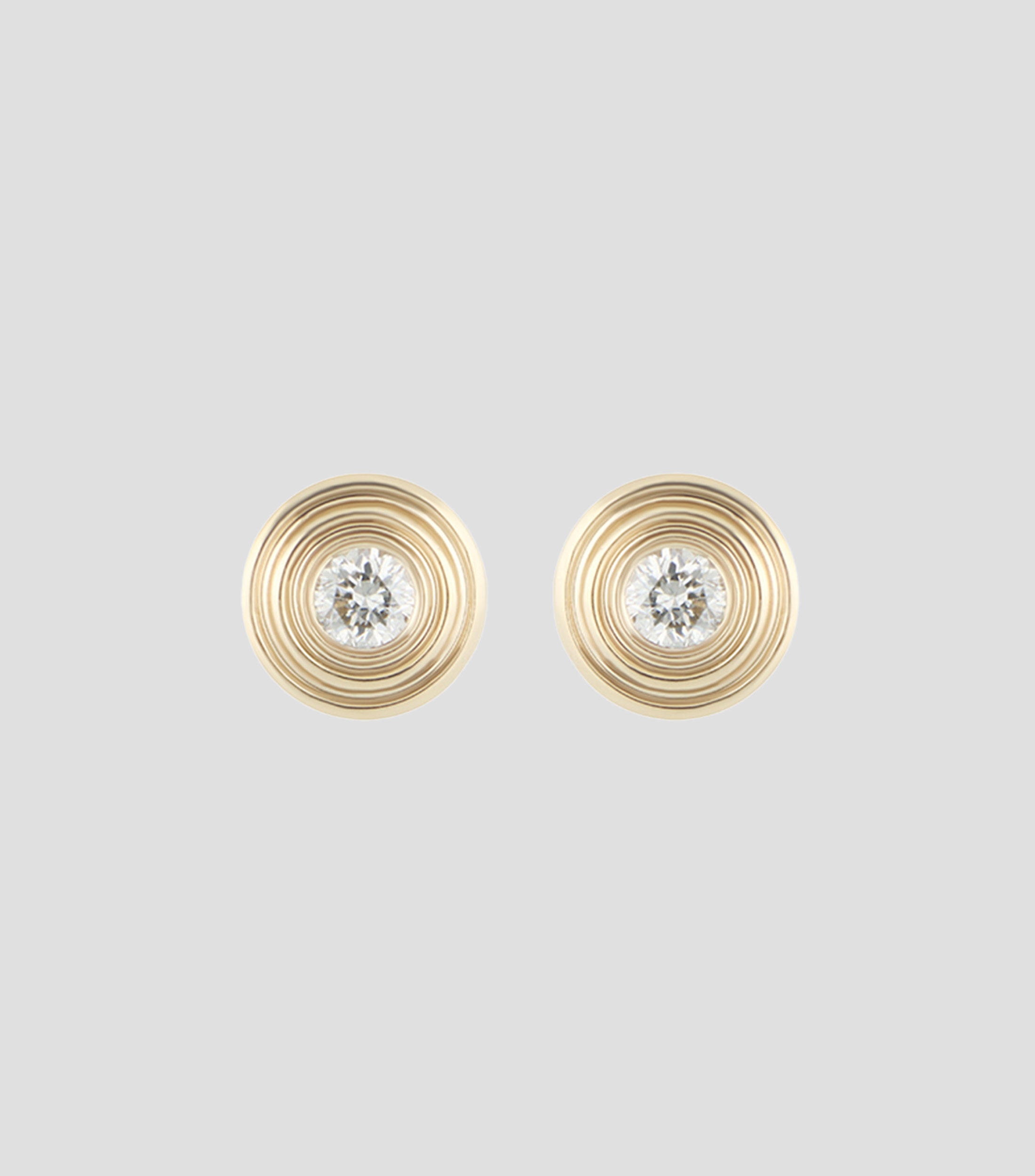 Aretes en oro amarillo de 18 kilates con diamante Mujer