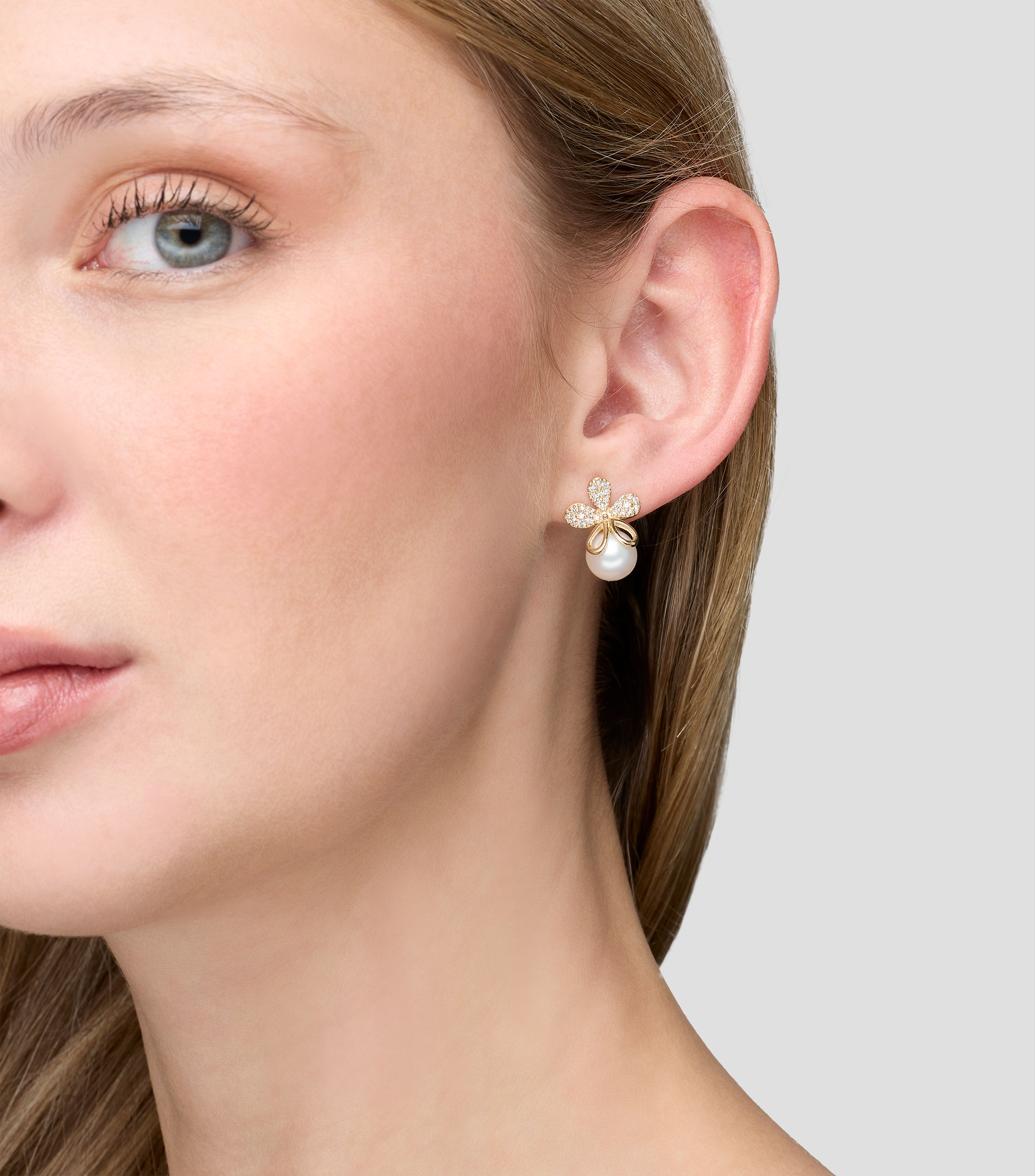 Aretes en oro amarillo de 14 kilates con diamantes y perla Mujer