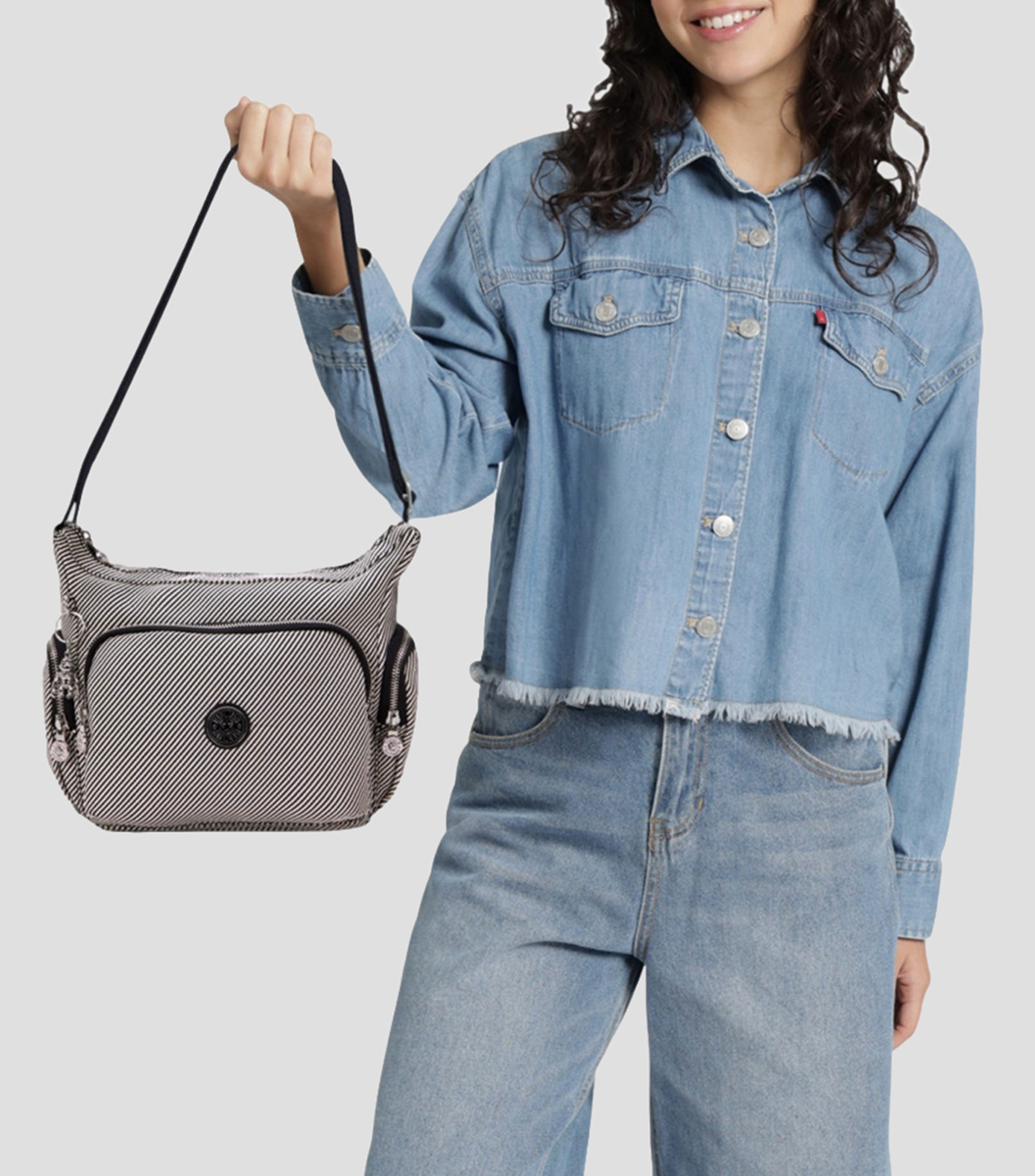 Bolsa crossbody a rayas Niña