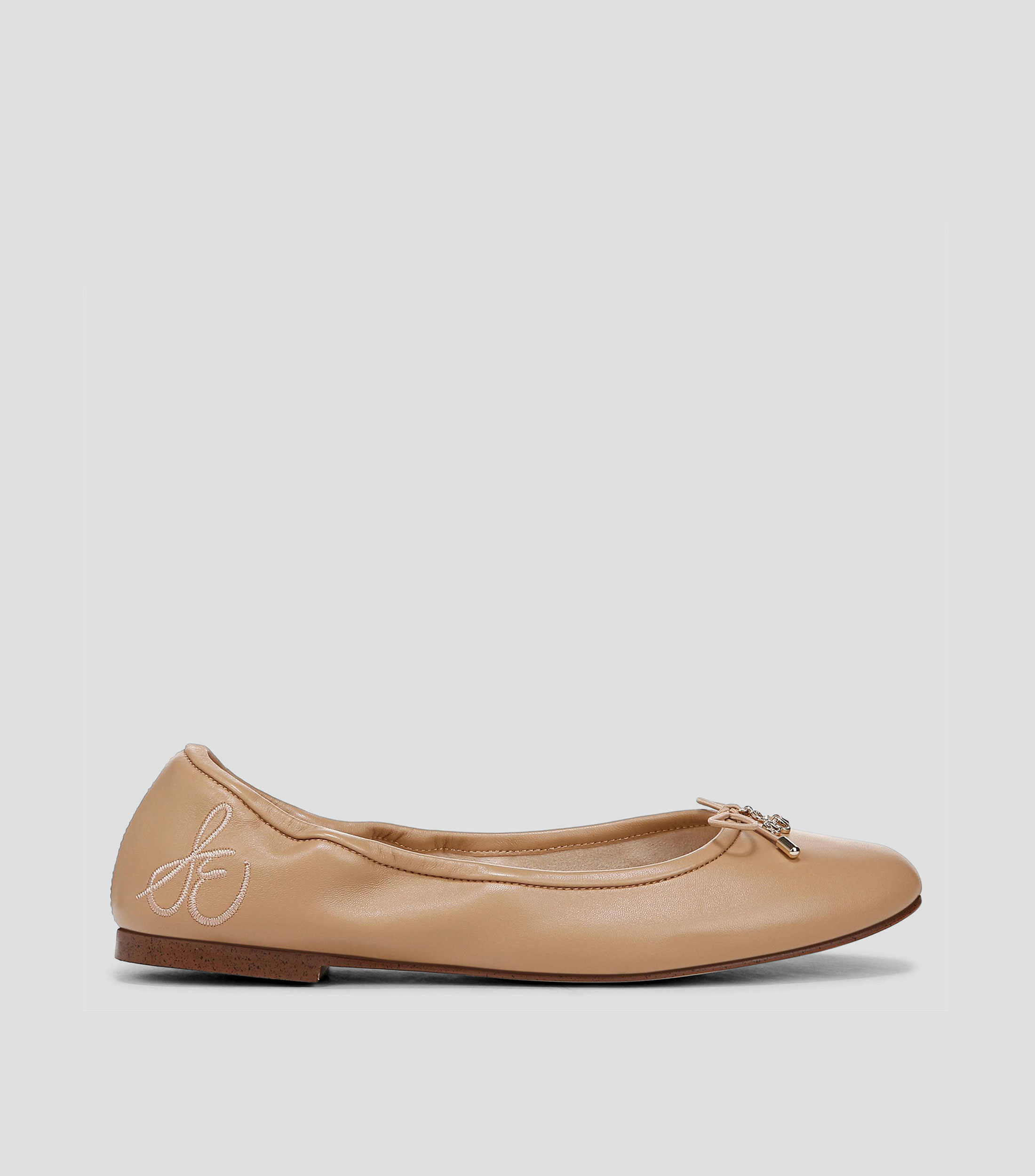 Flats en piel con moño Mujer