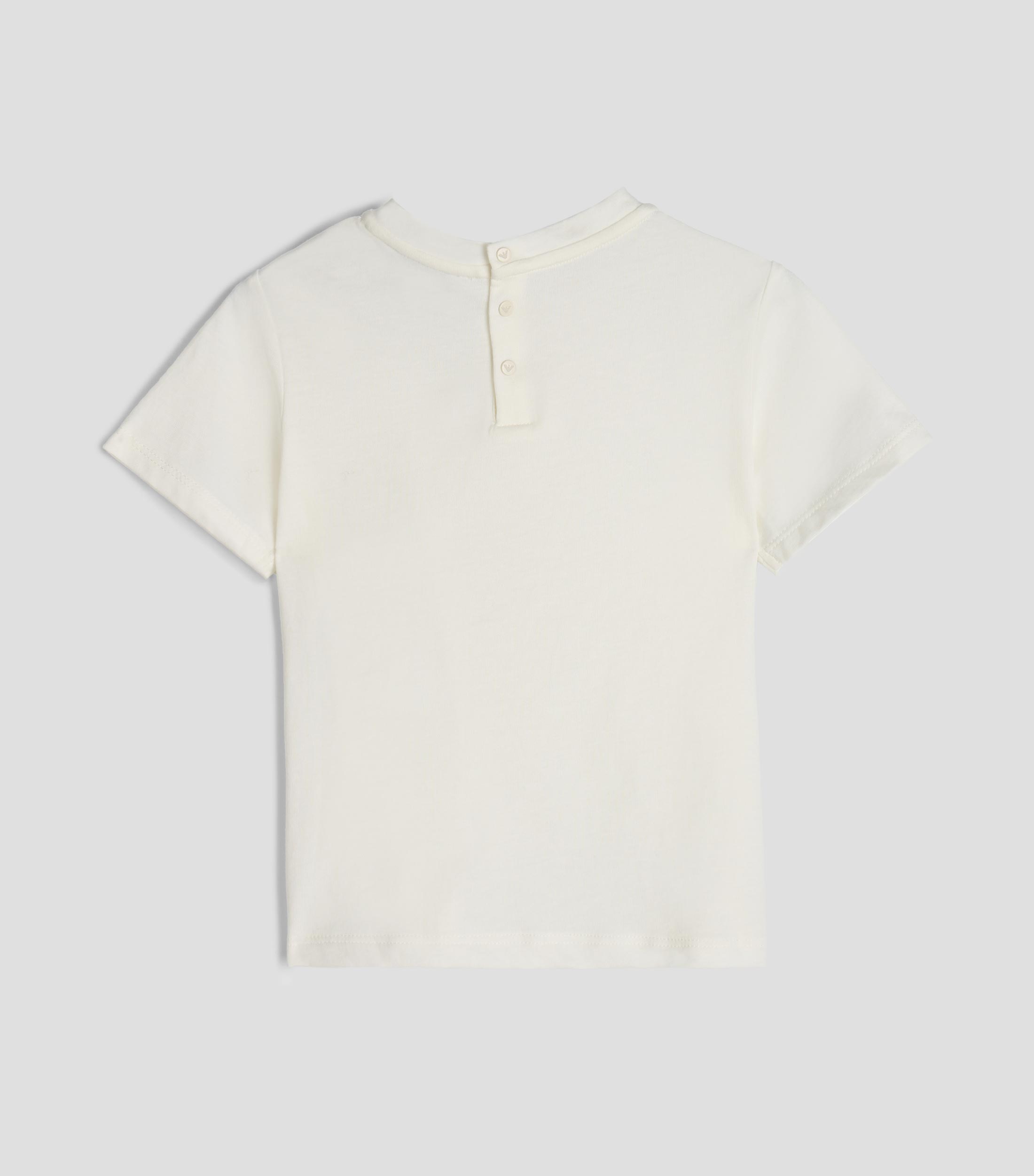 Playera de cuello redondo con manga corta lisa Niña
