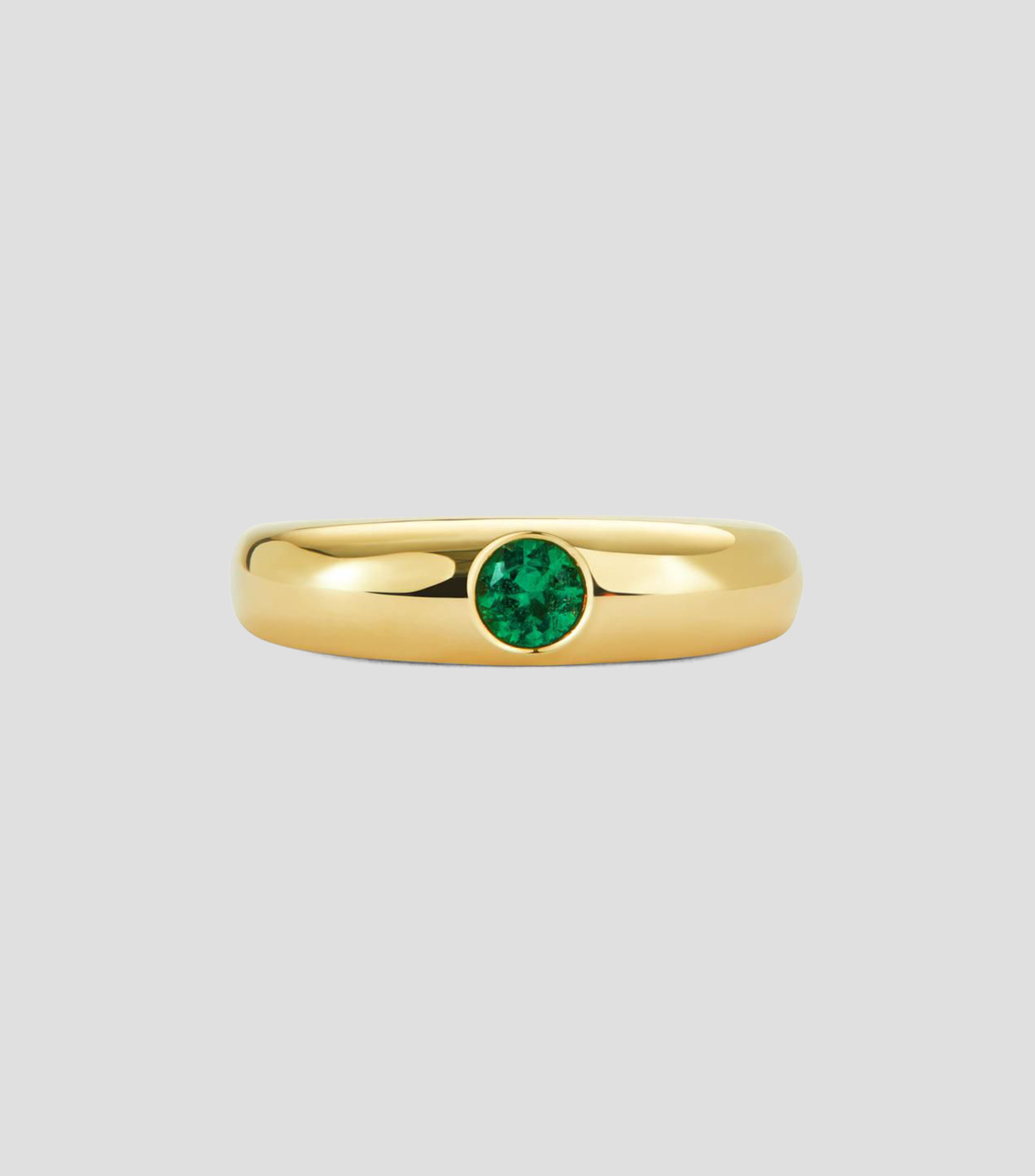 Anillo en Oro amarillo de 18 Kilates con esmeralda en talla brillante Mujer
