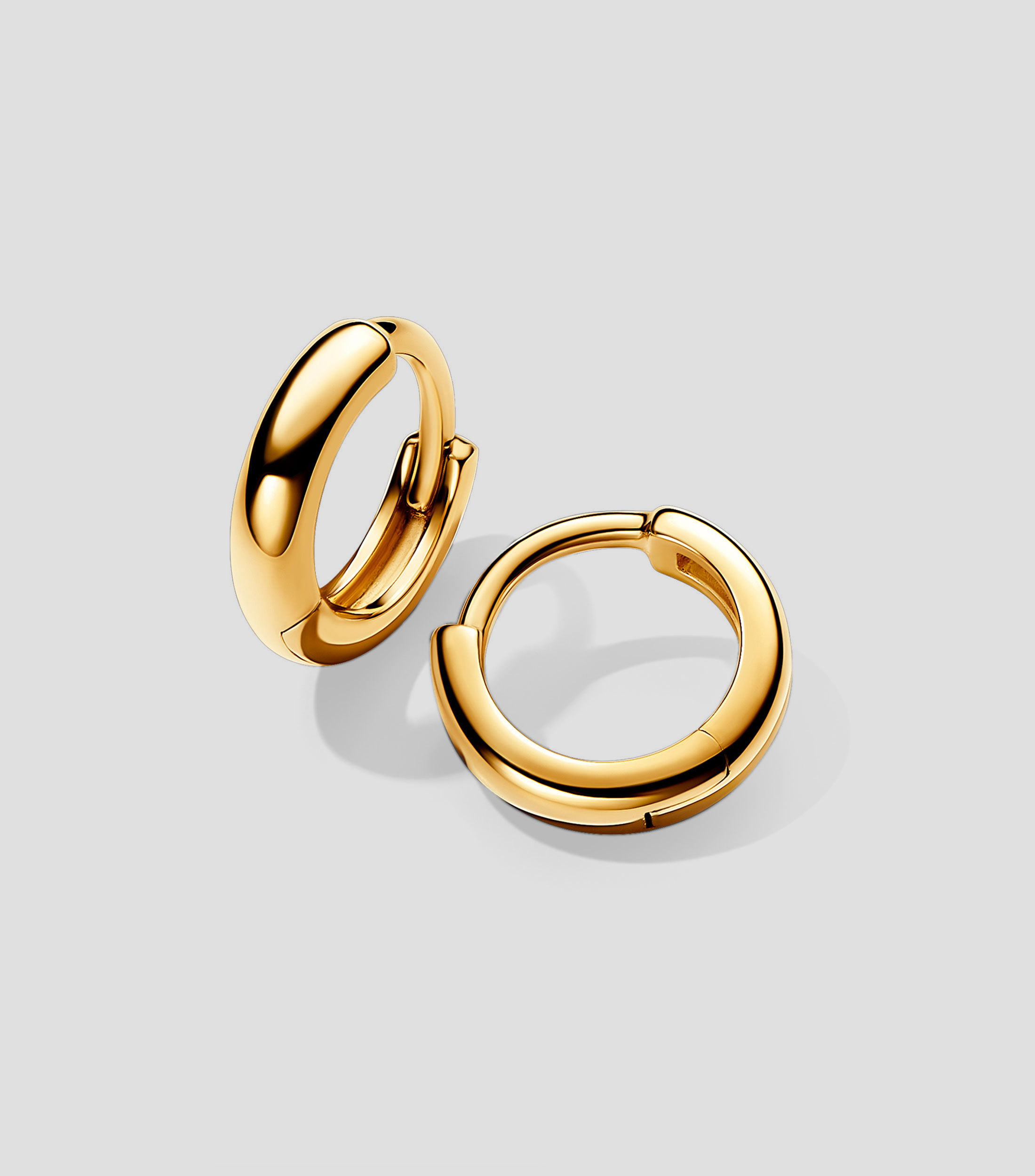 Aretes redondos Mujer
