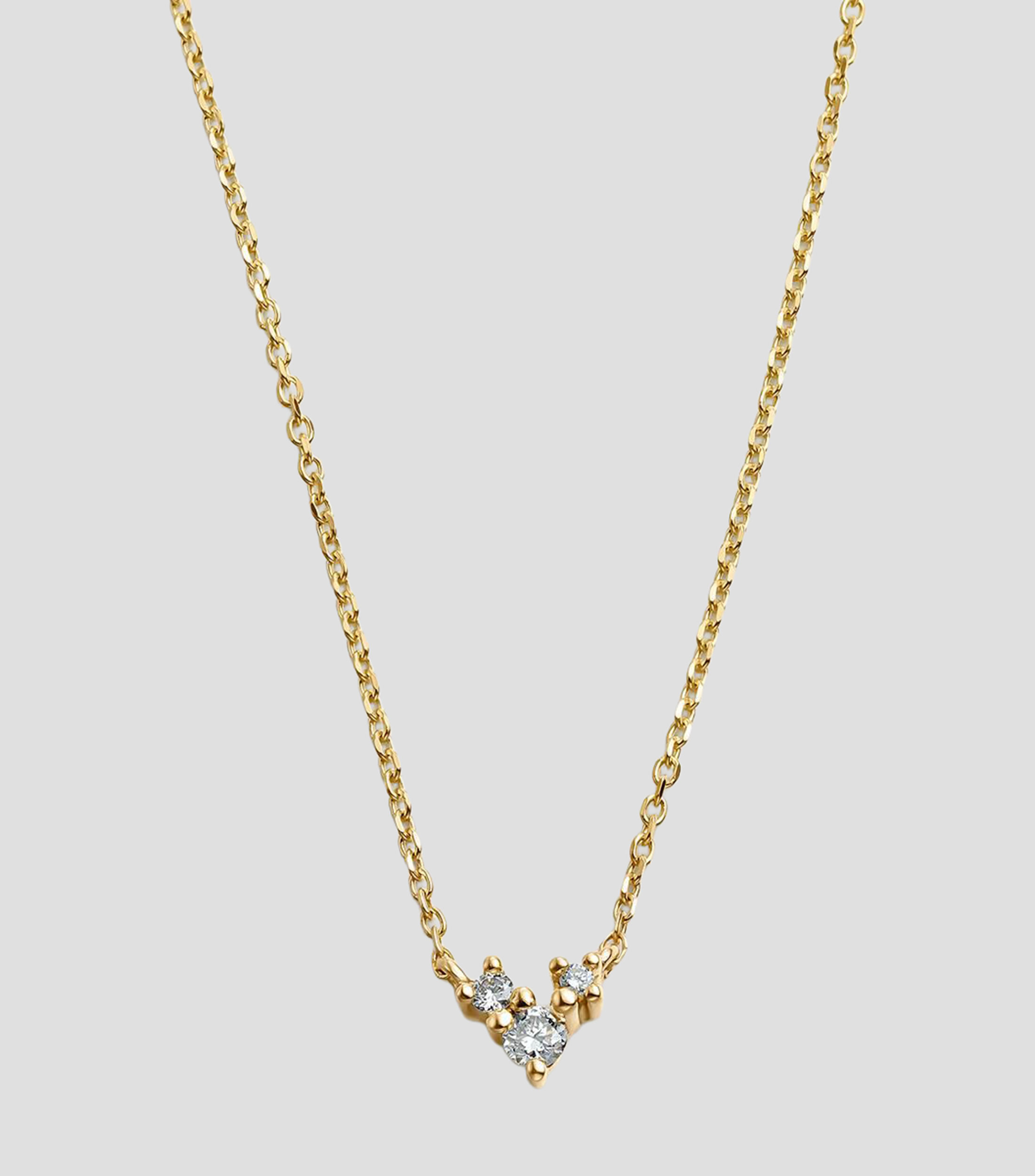 Collar en oro amarillo de 18 kilates con tres diamantes Mic Mujer