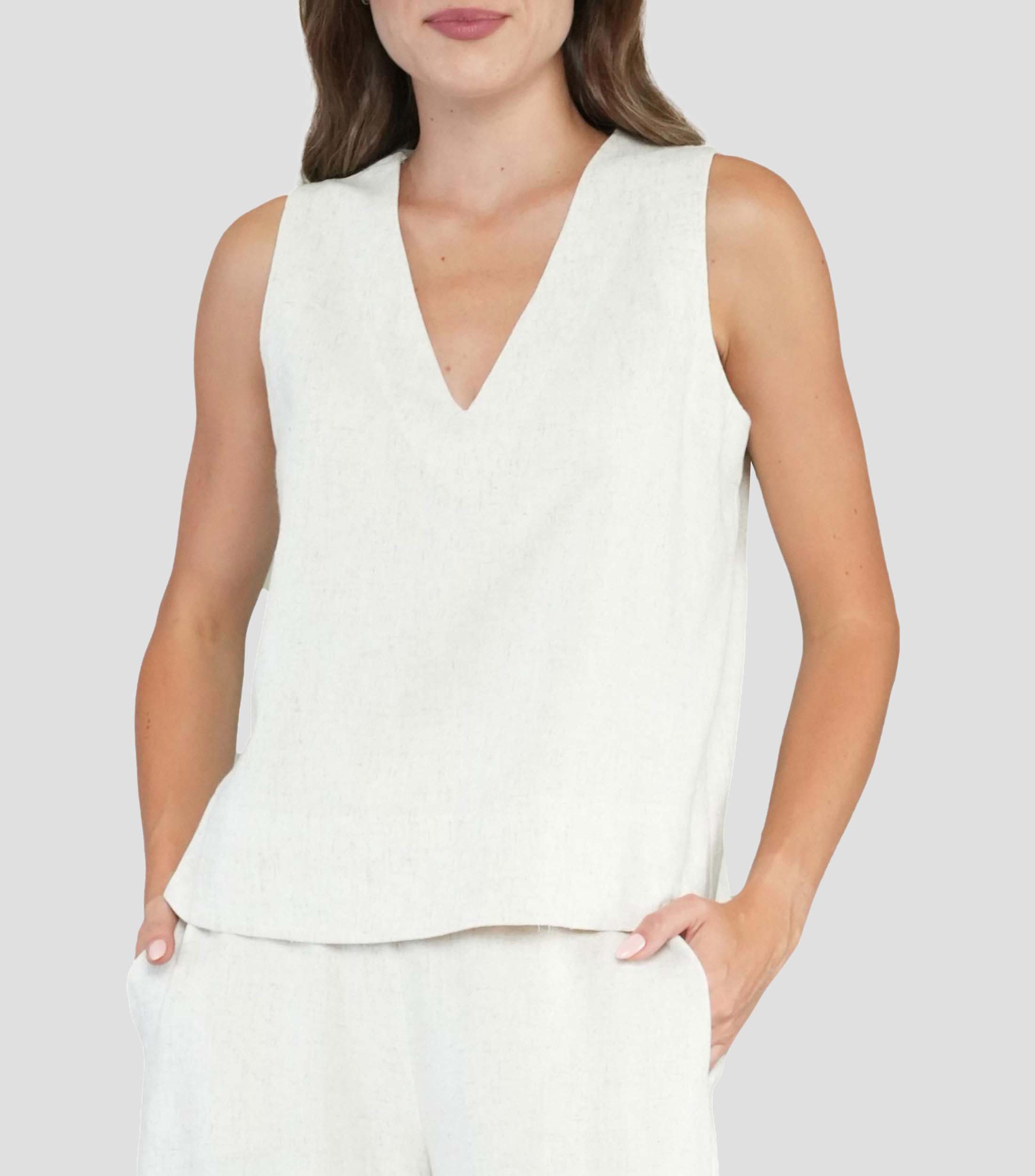 Blusa lisa sin mangas Mujer