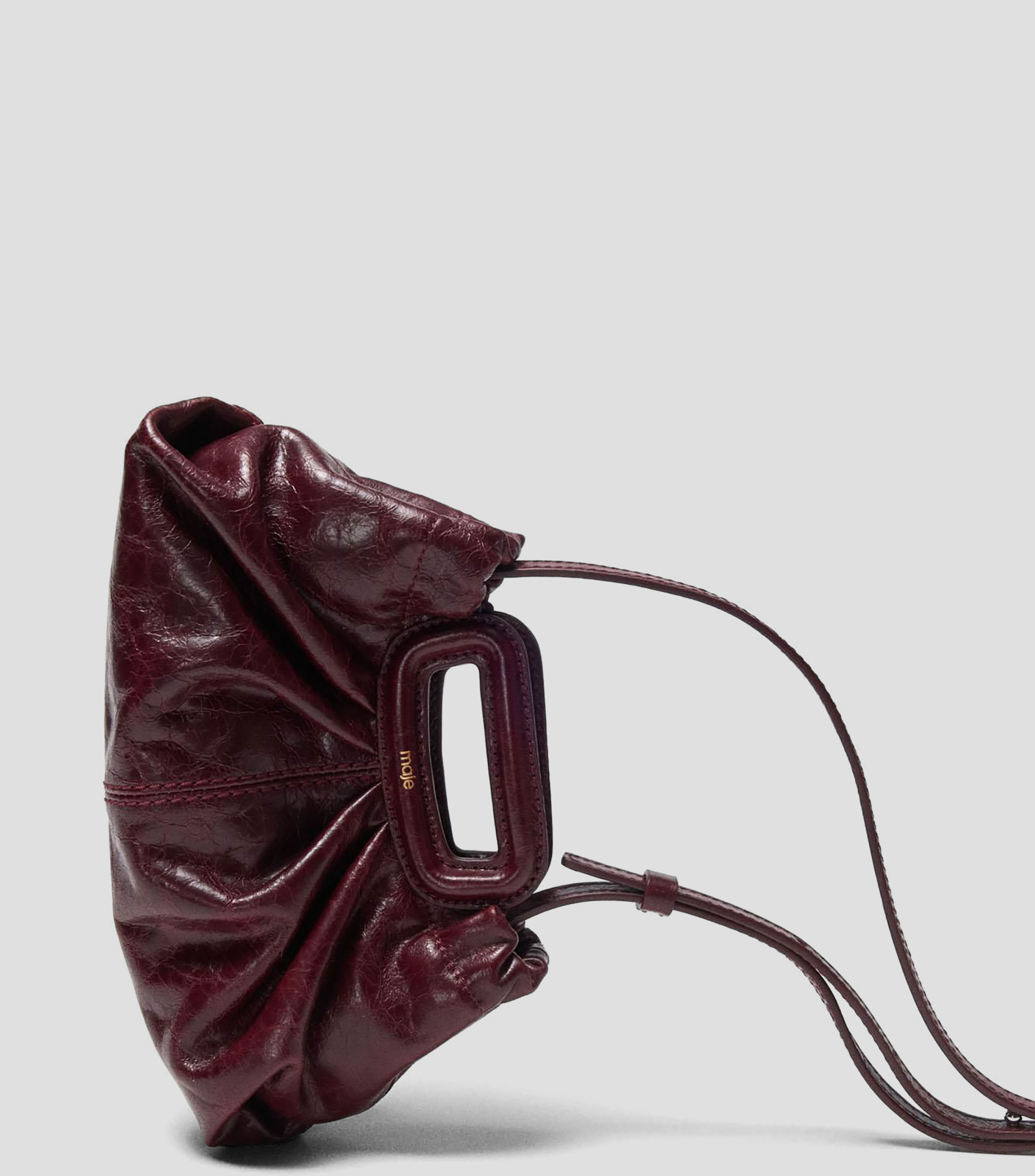 Bolsa clutch en piel lisa Mujer