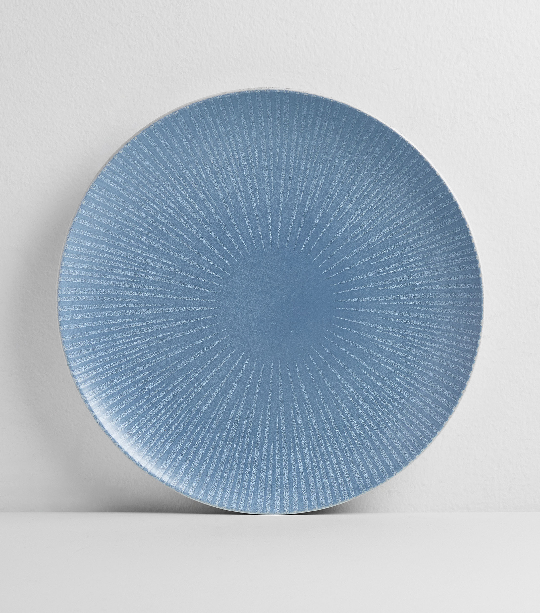 Plato trinche en cerámica azul