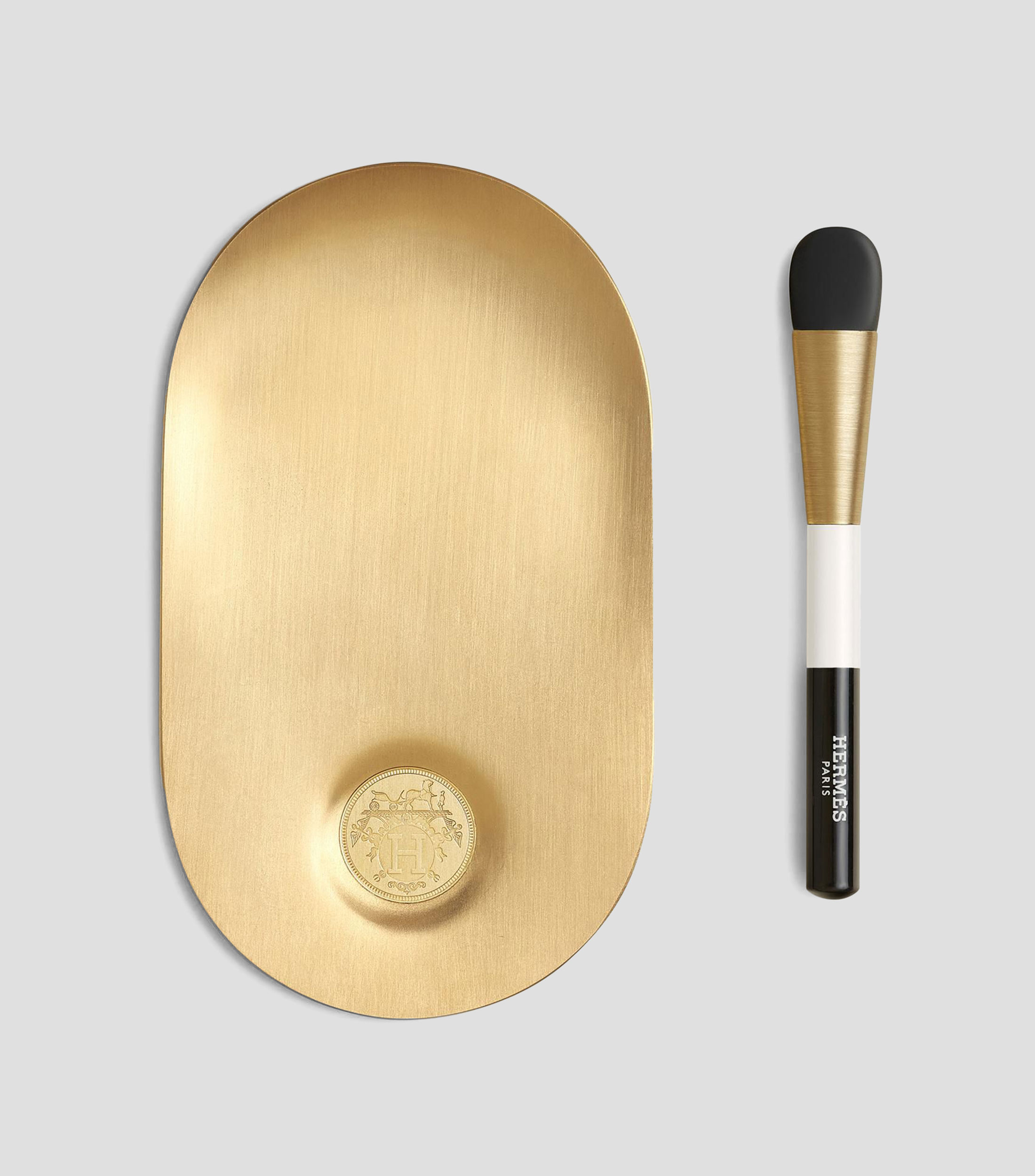 Paleta y espátula para base de maquillaje