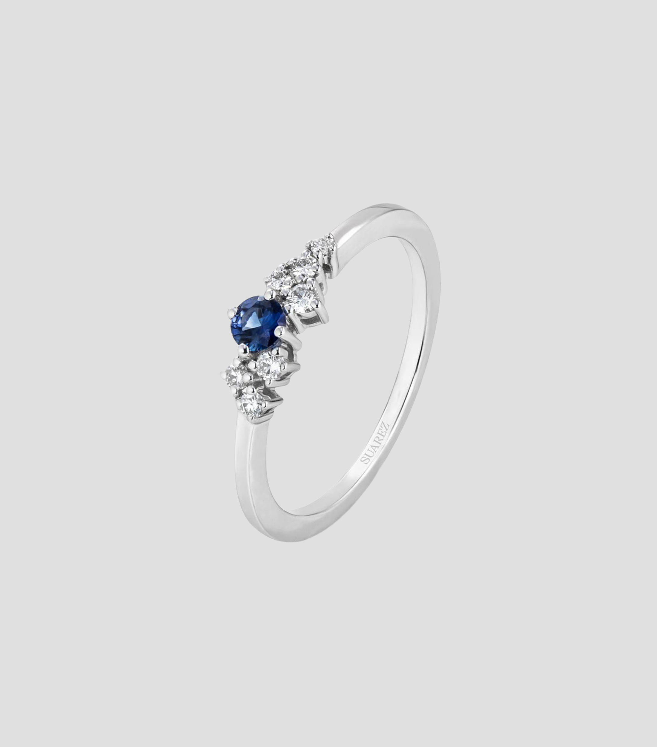 Anillo solitario en oro blanco 18 Kilates con diamantes y zafiro Mujer