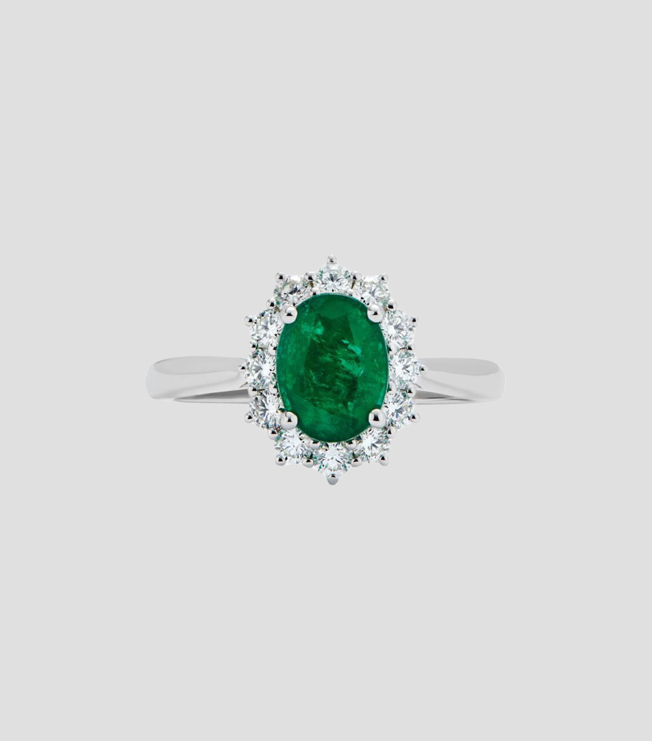 Anillo en Oro blanco de 18 Kilates con esmeralda y diamante Mujer
