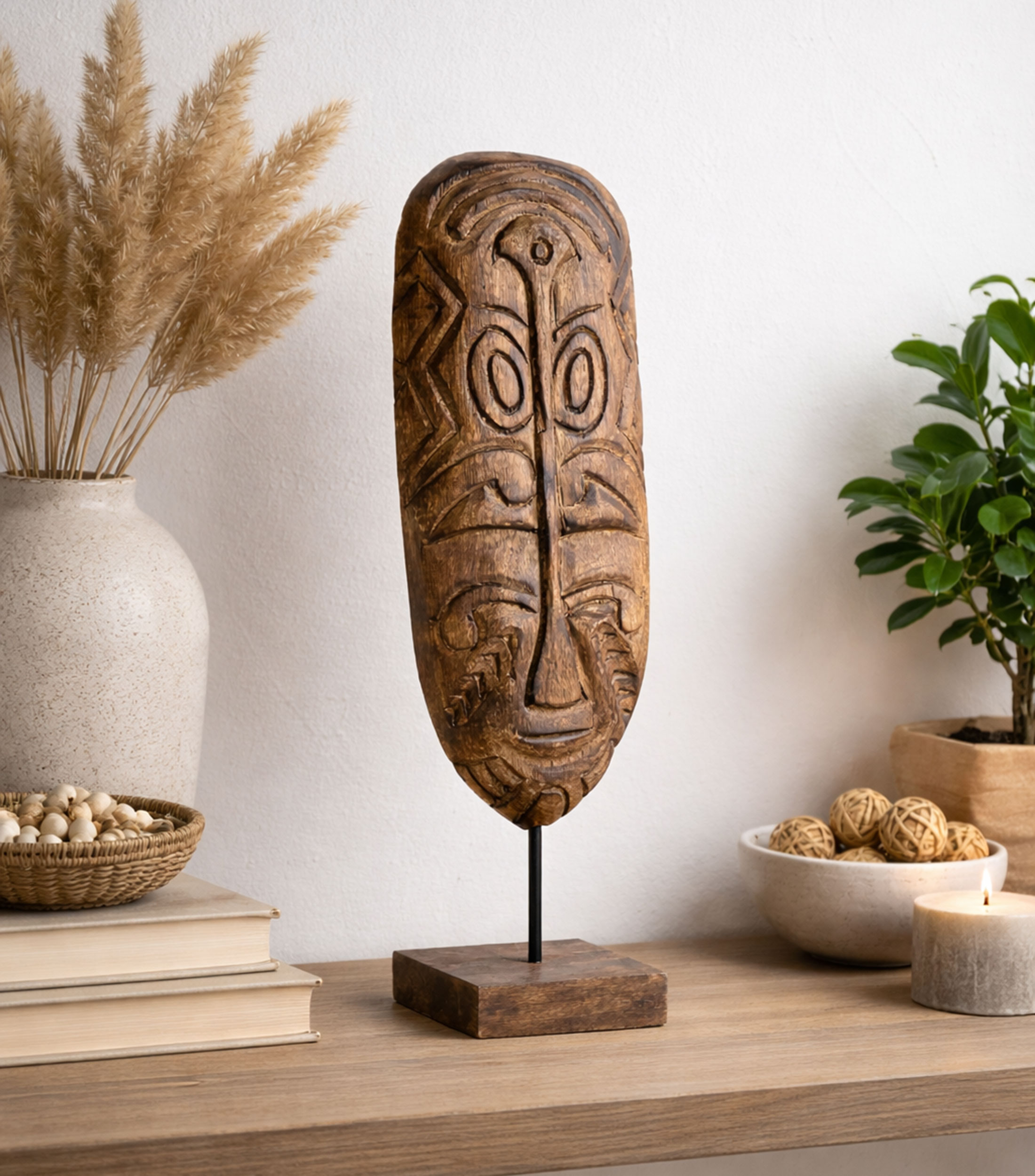 Figura decorativa de máscara en madera