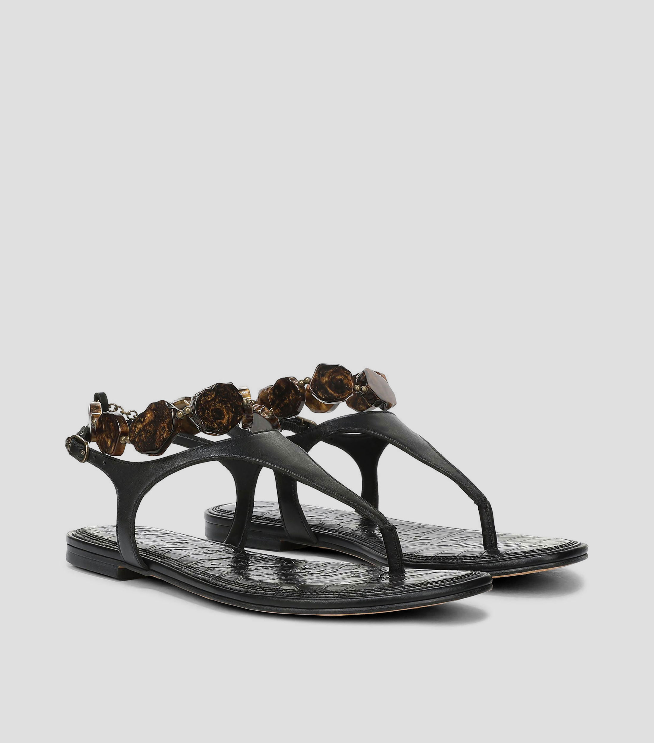 Sandalias planas en piel Mujer