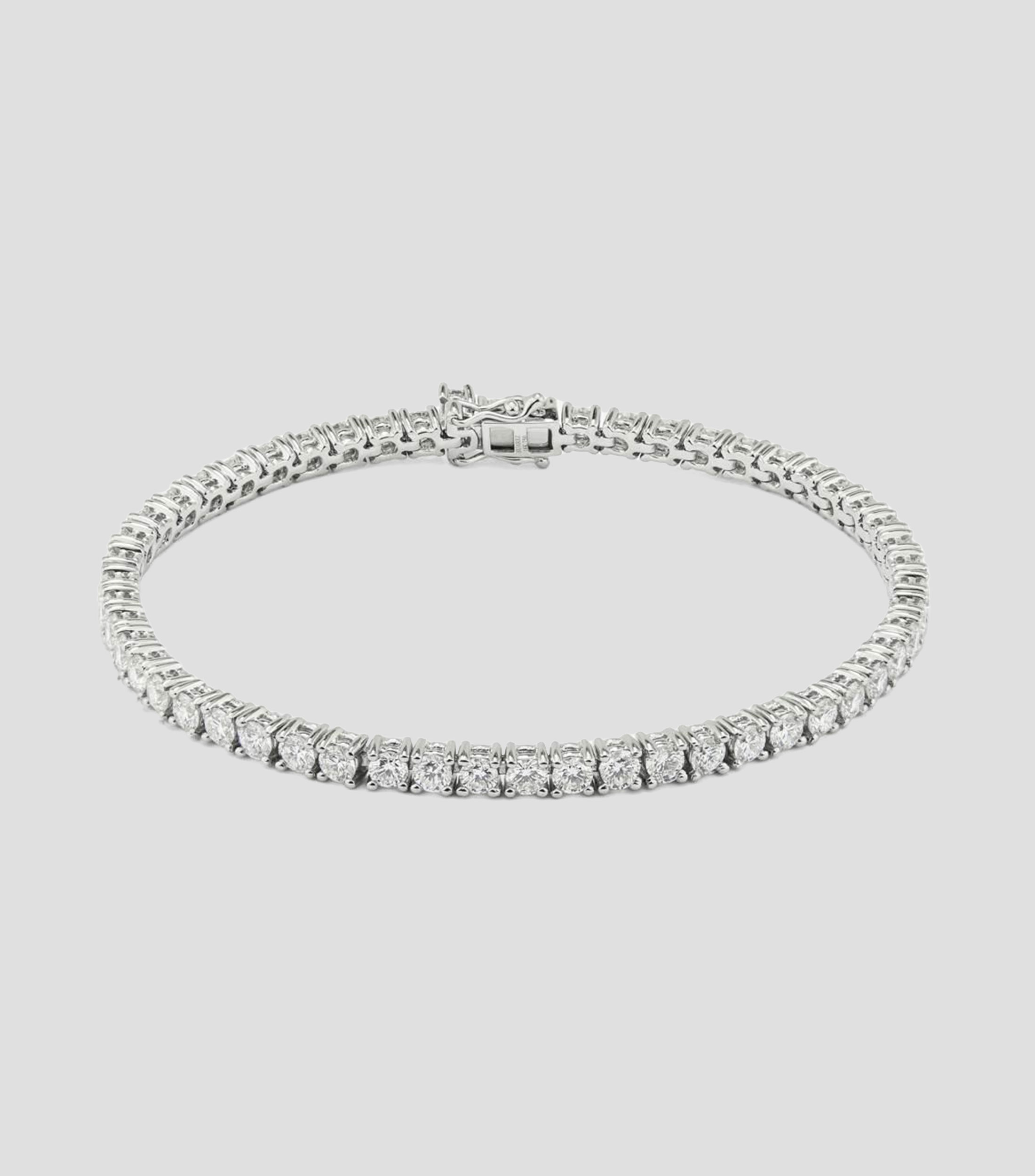 Brazalete Rivière de Oro blanco de 18 Kilates con diamantes Mujer