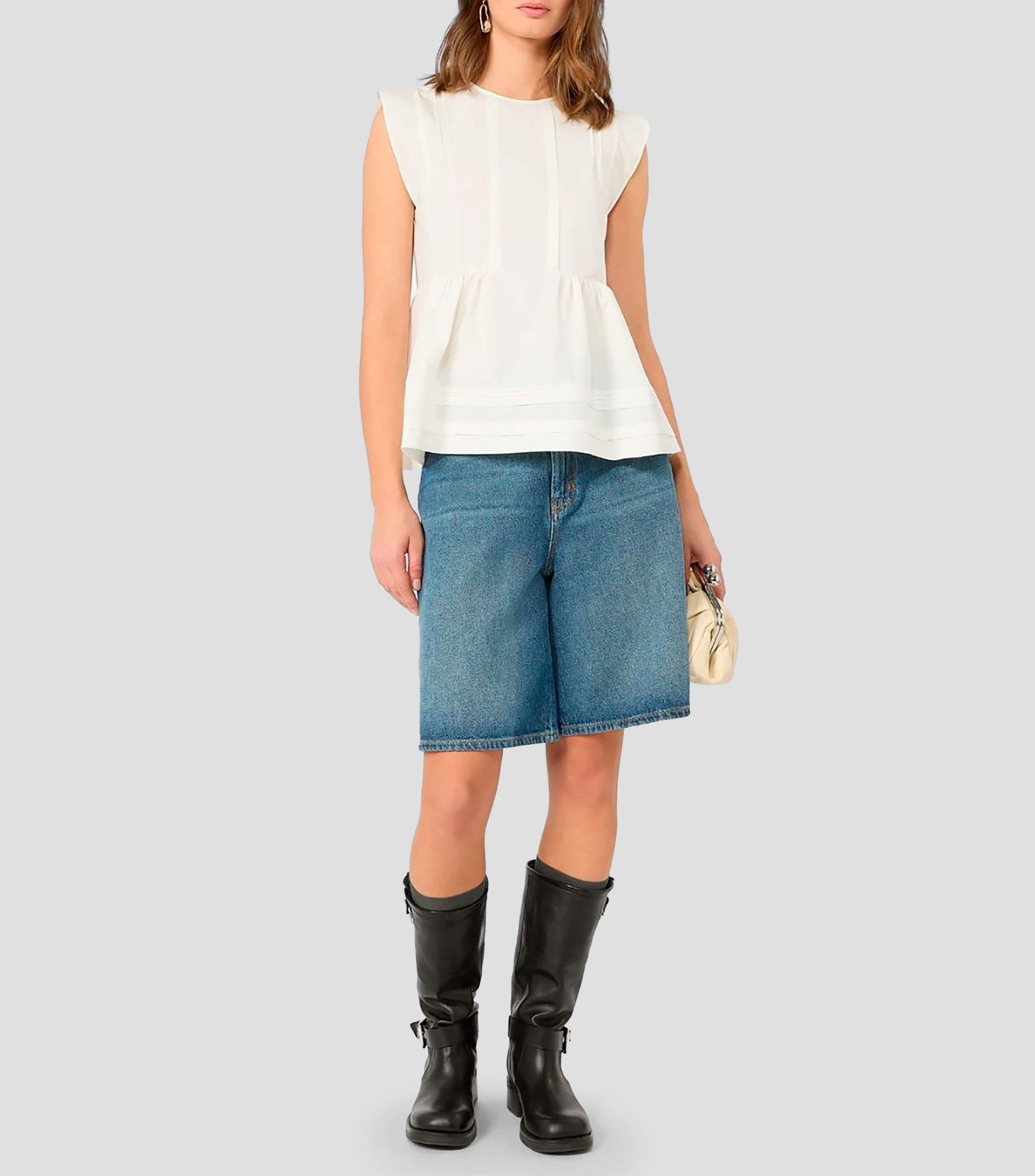 Blusa lisa sin mangas Mujer