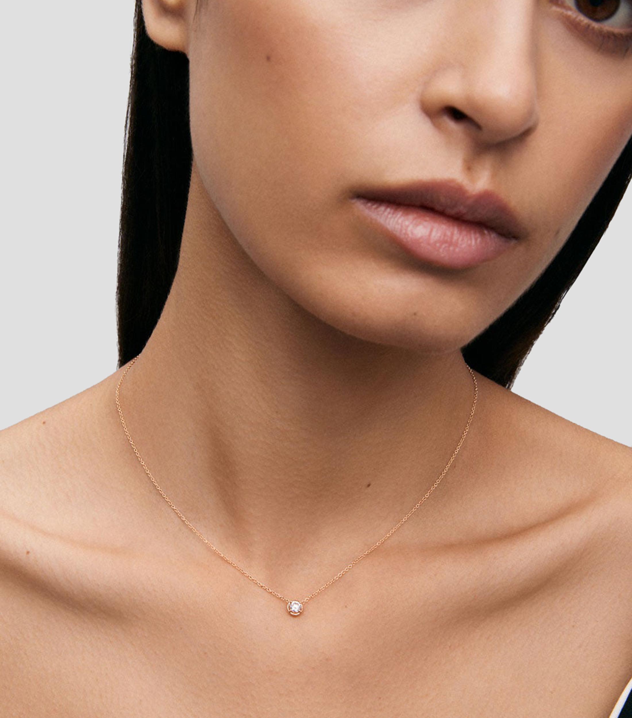 Collar oro de 18 kilates con dije de diamante Mujer