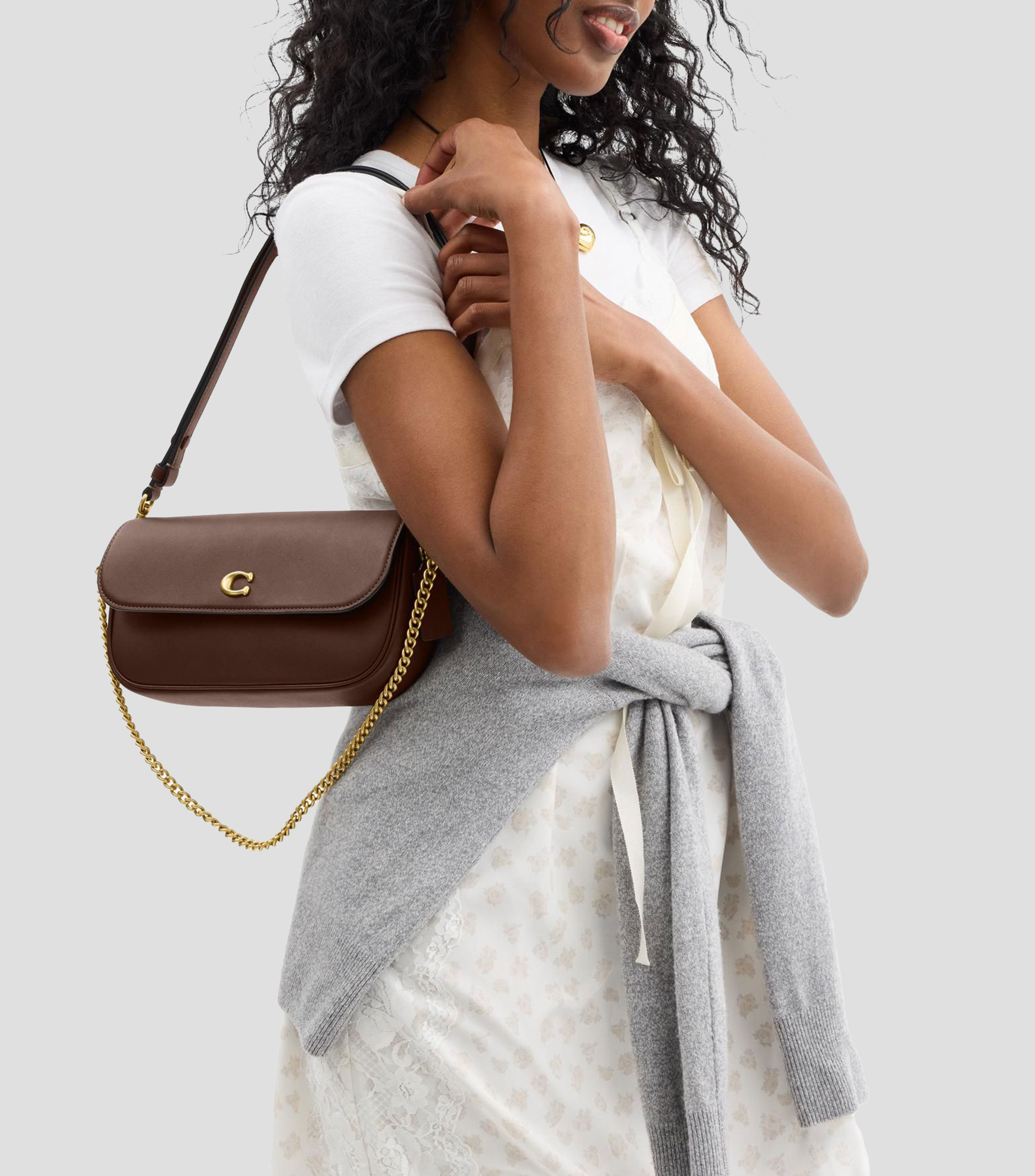 Bolsa clutch en piel lisa Mujer