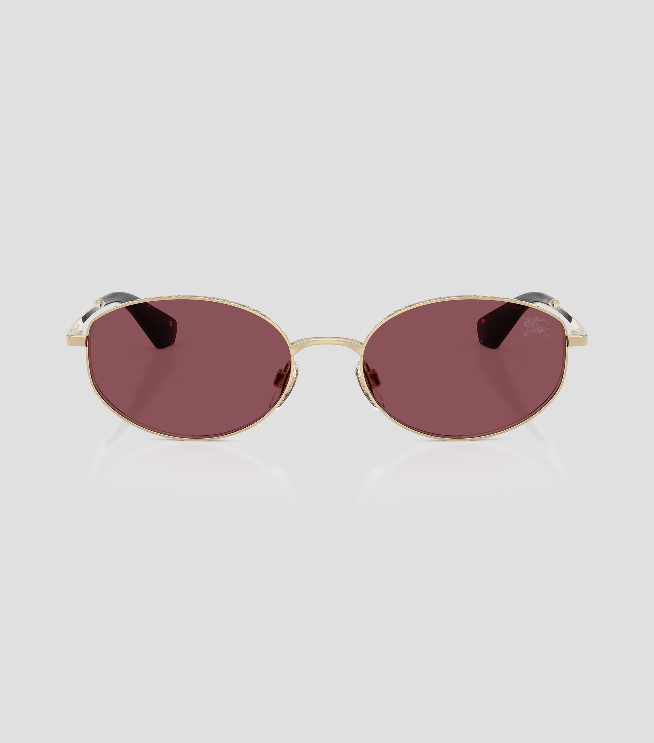 Lentes de sol ovalados dorados Mujer