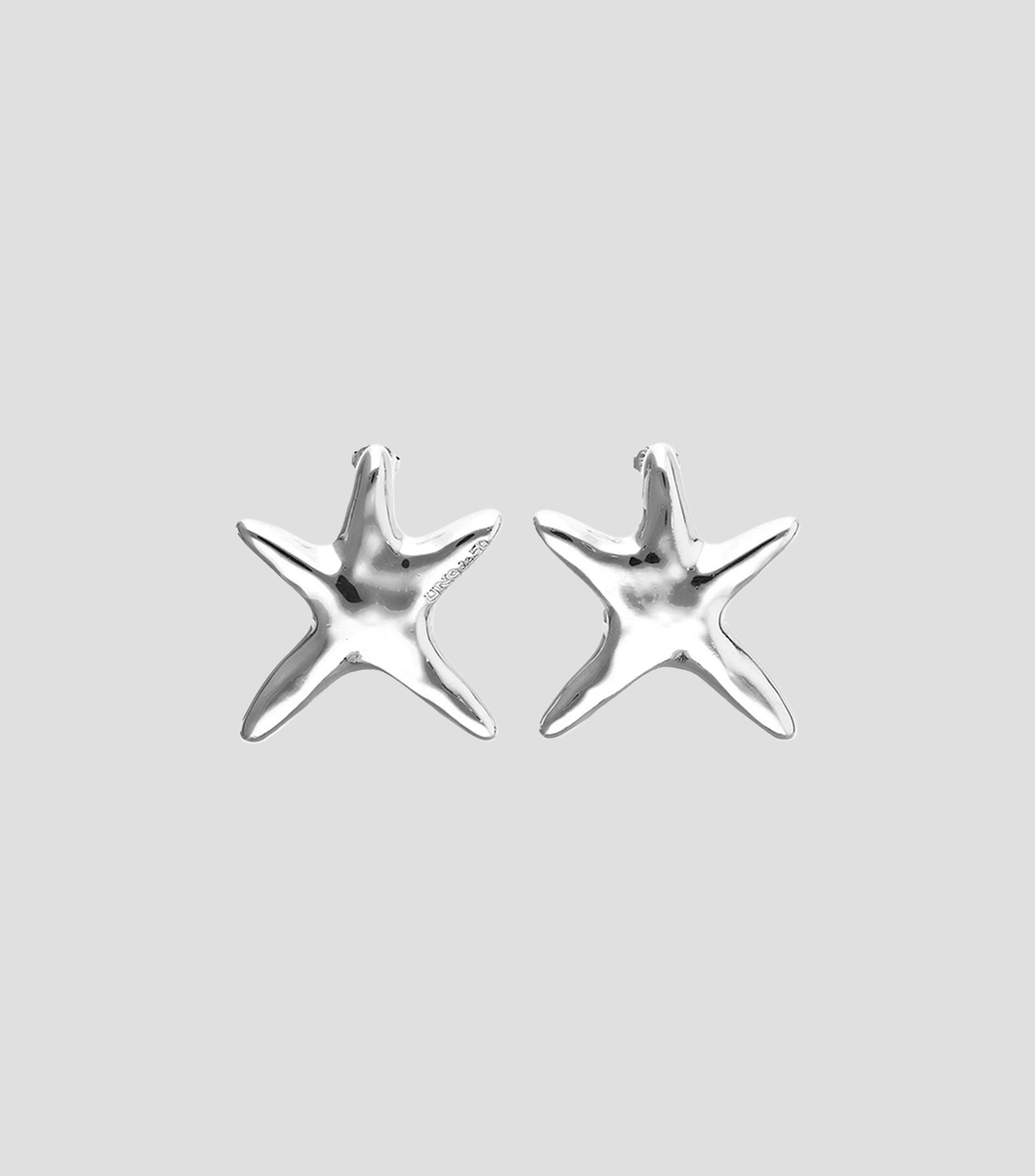 Aretes grandes estrella Arcadia Mujer