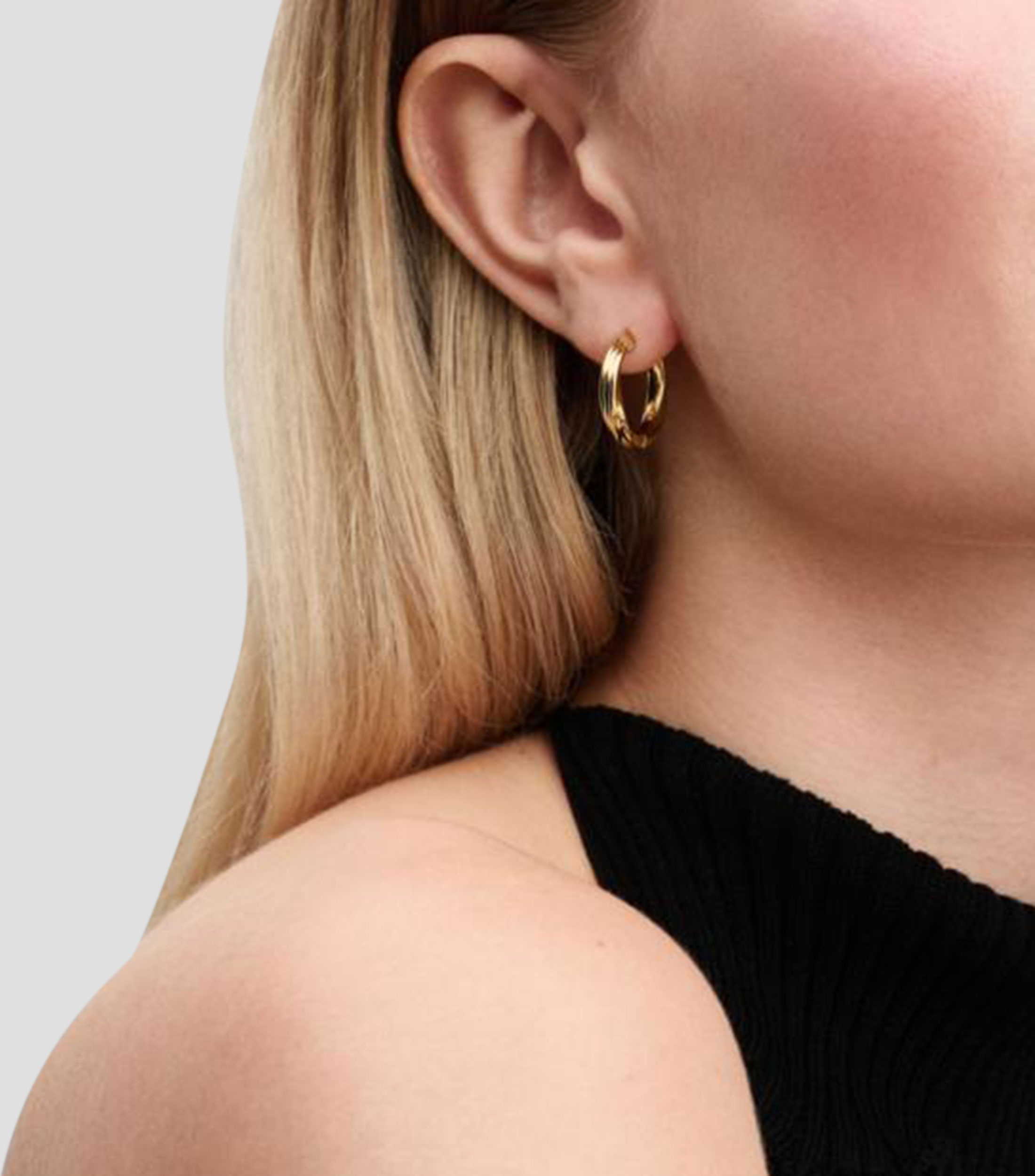 Aretes en plata con detalle trenzado Mujer
