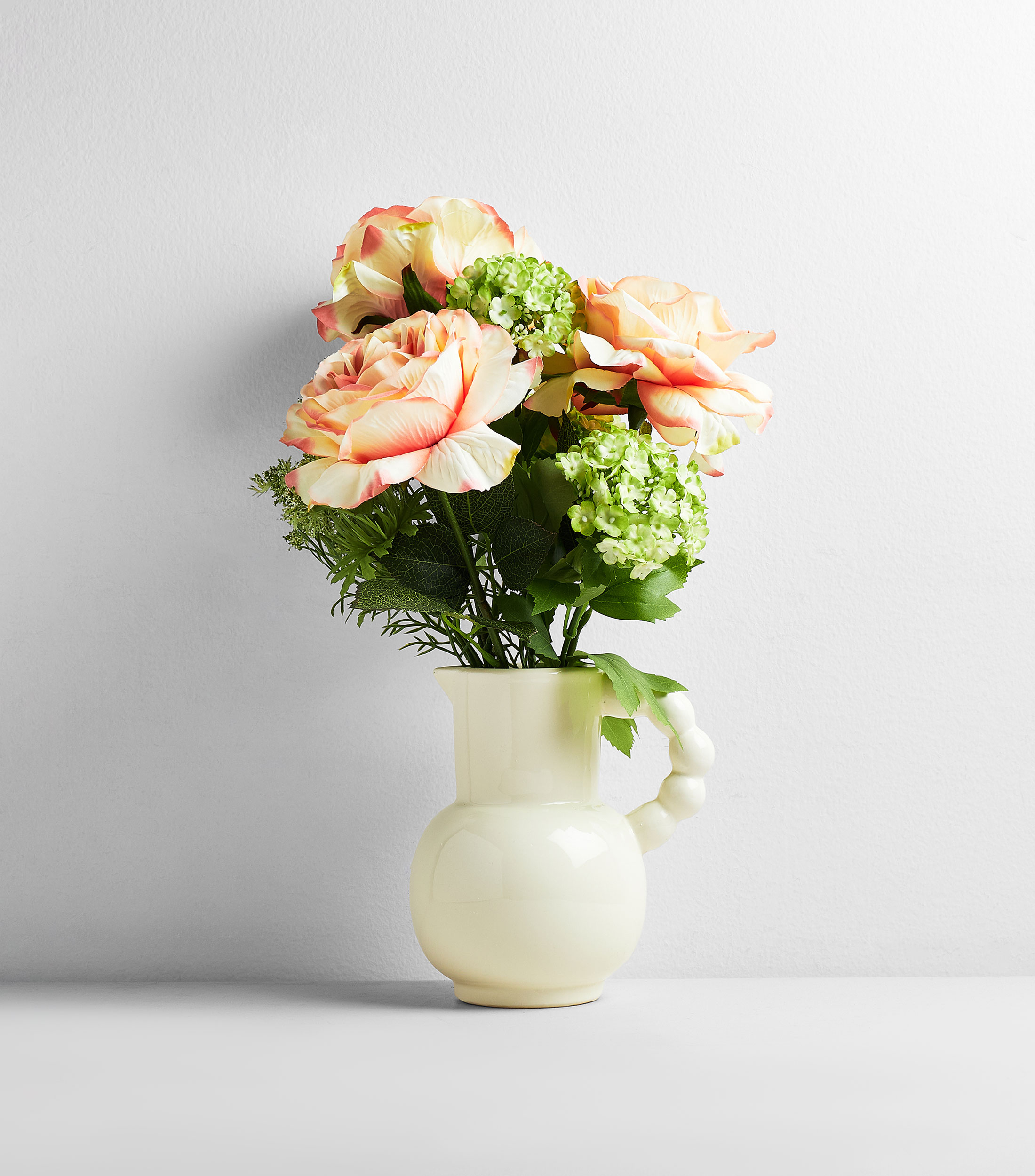 Arreglo de rosas decorativas en maceta, artificial