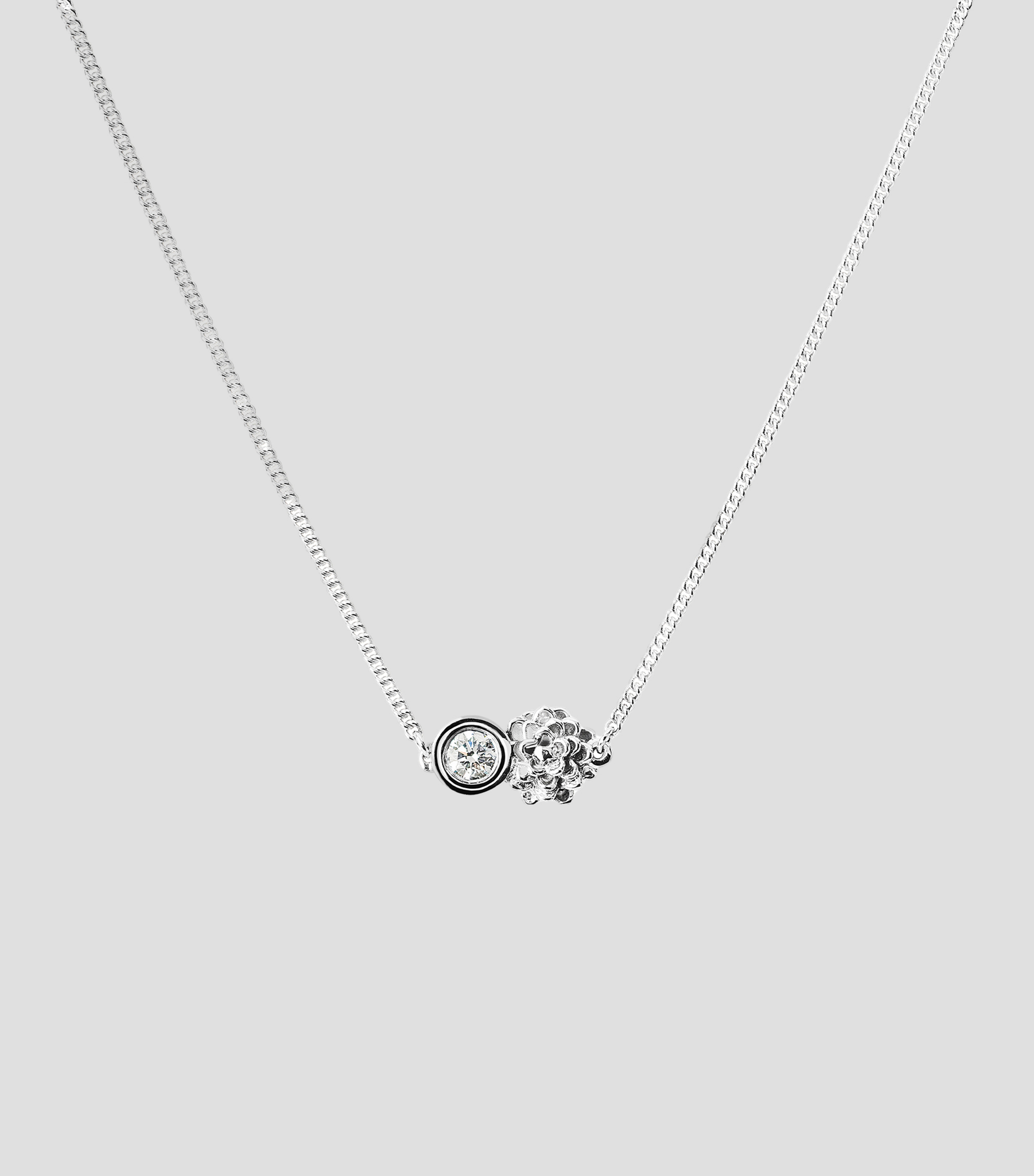 Dije en plata con diamante Mujer