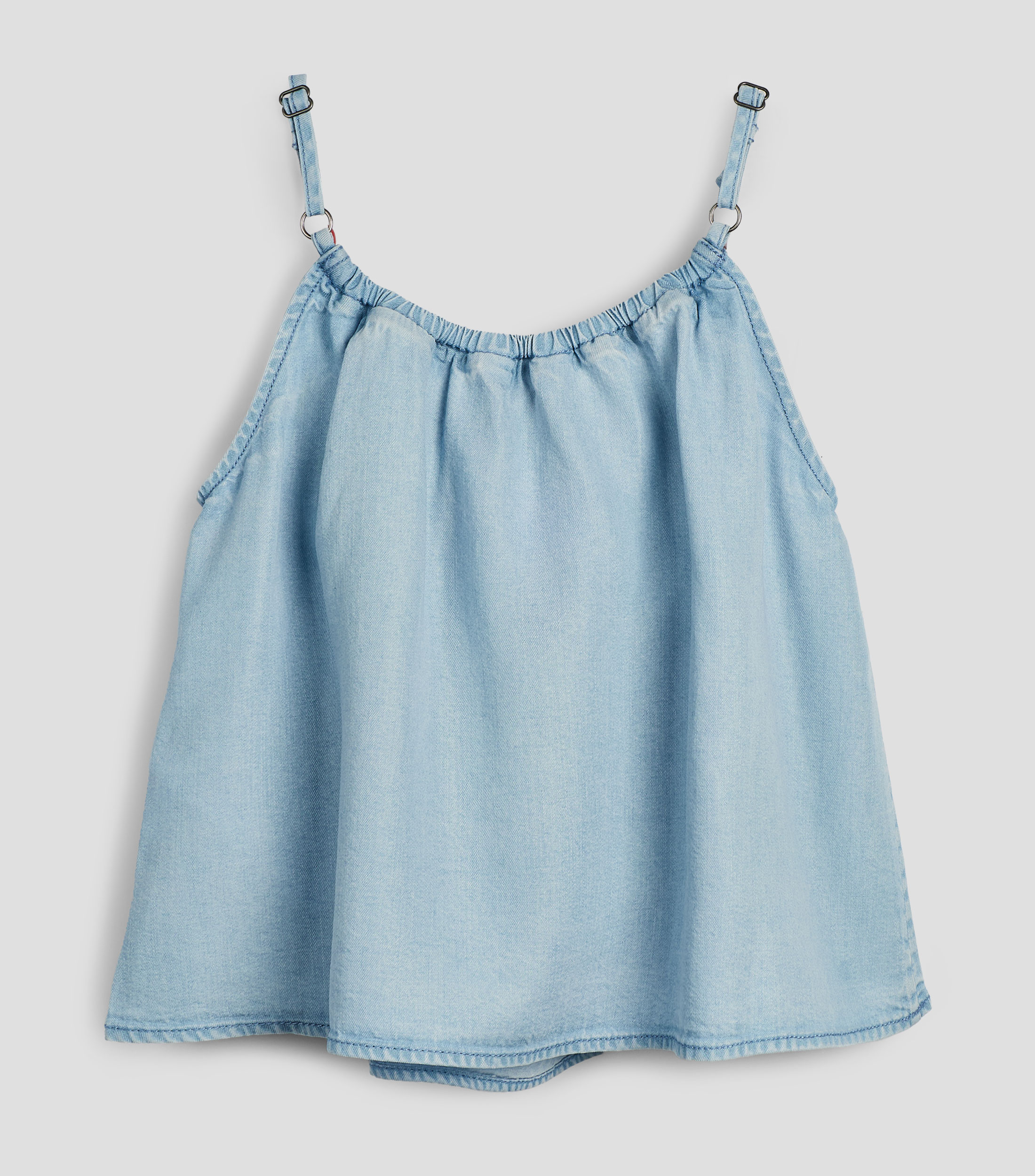 Blusa lisa sin mangas Niña