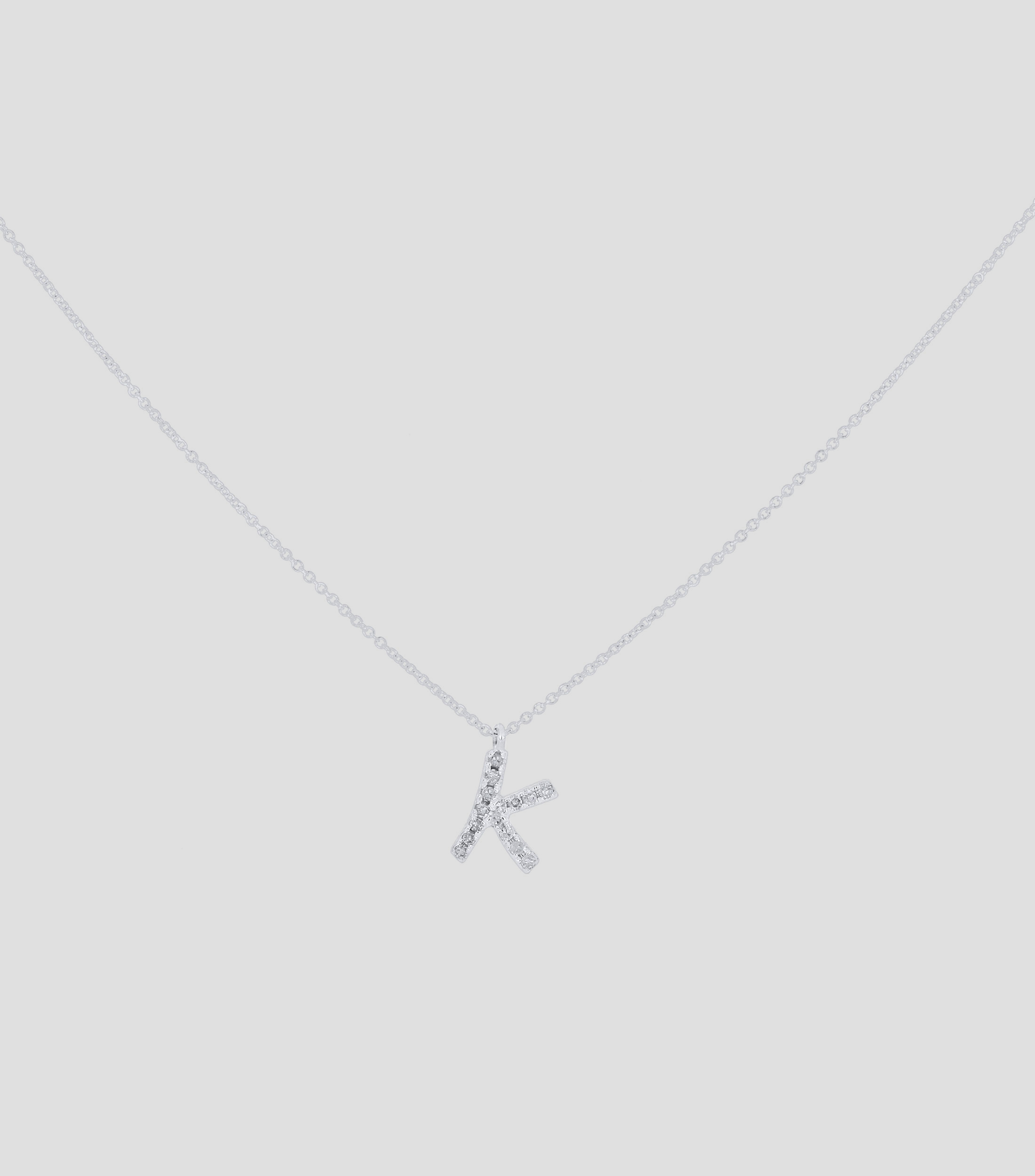 Dije en letra "K" y cadena en Oro blanco 14 Kts Mujer
