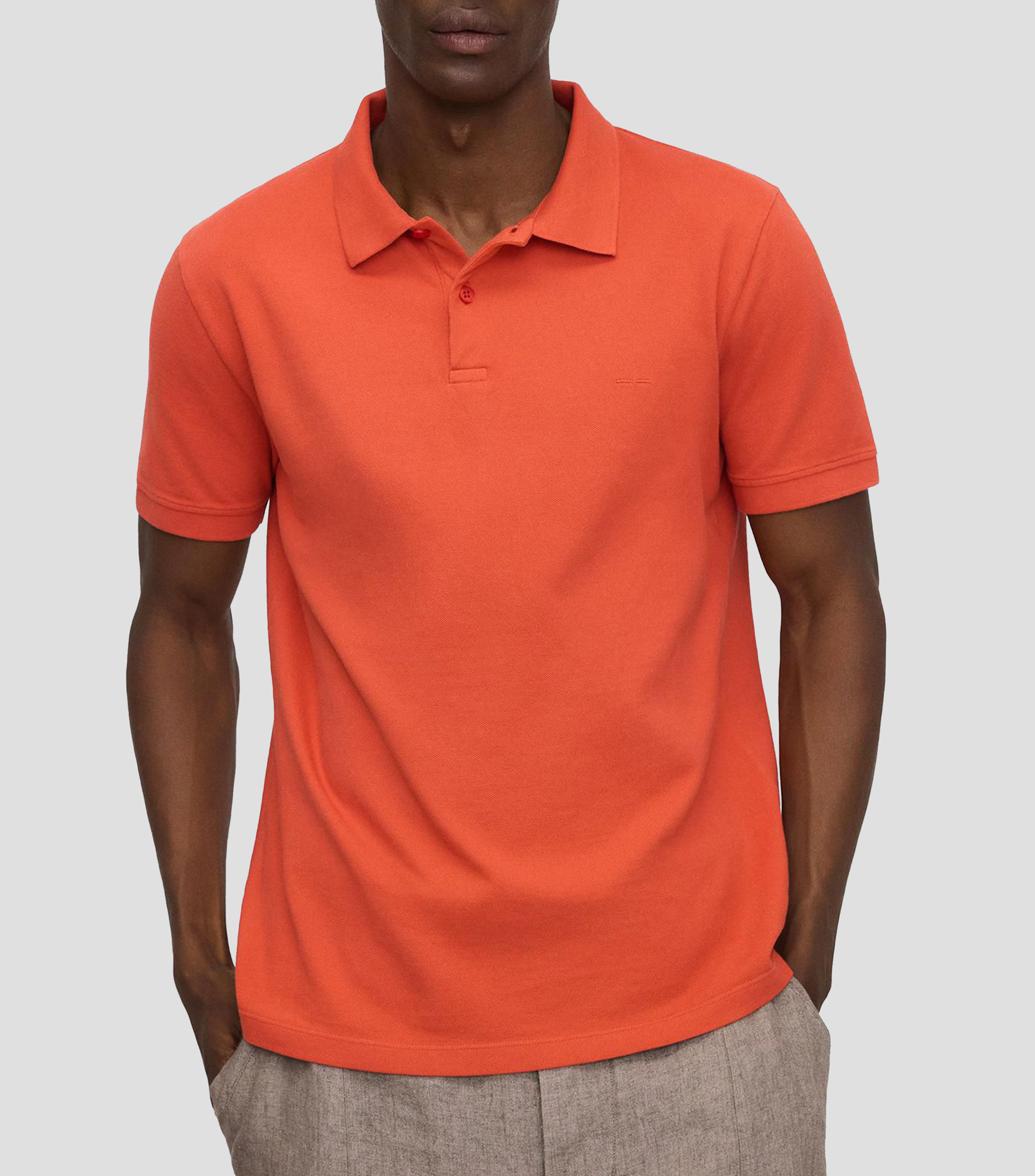 Playera tipo polo con manga corta lisa Hombre