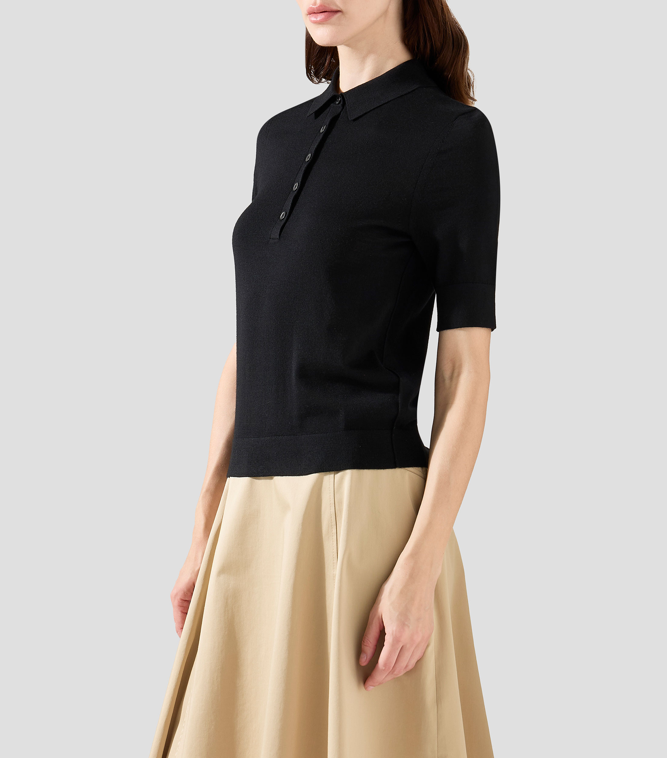 Playera estilo polo de manga corta en lana virgen con control de la humedad Mujer
