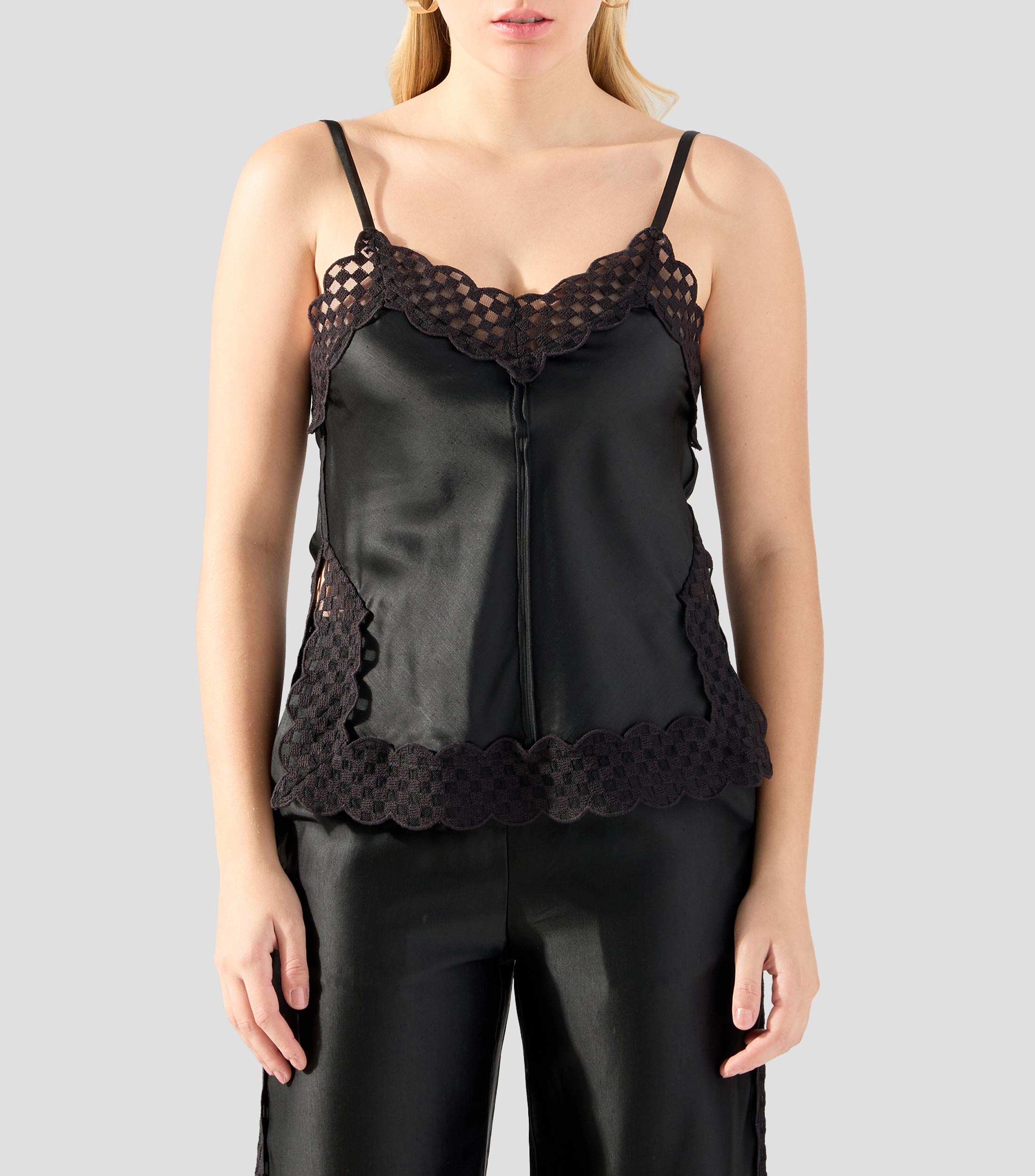 Blusa lisa sin mangas Mujer