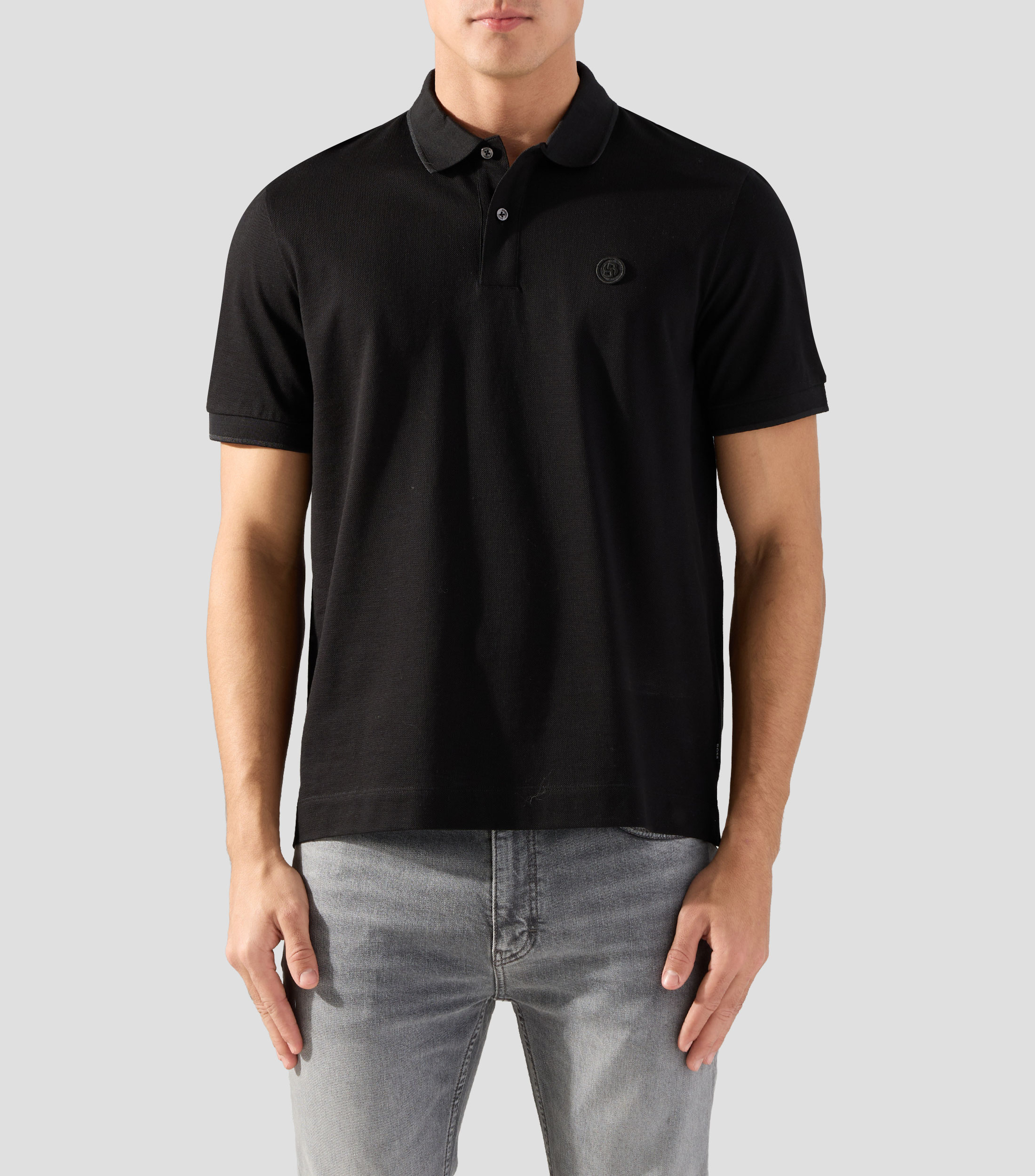 Playera tipo polo con manga corta lisa Hombre