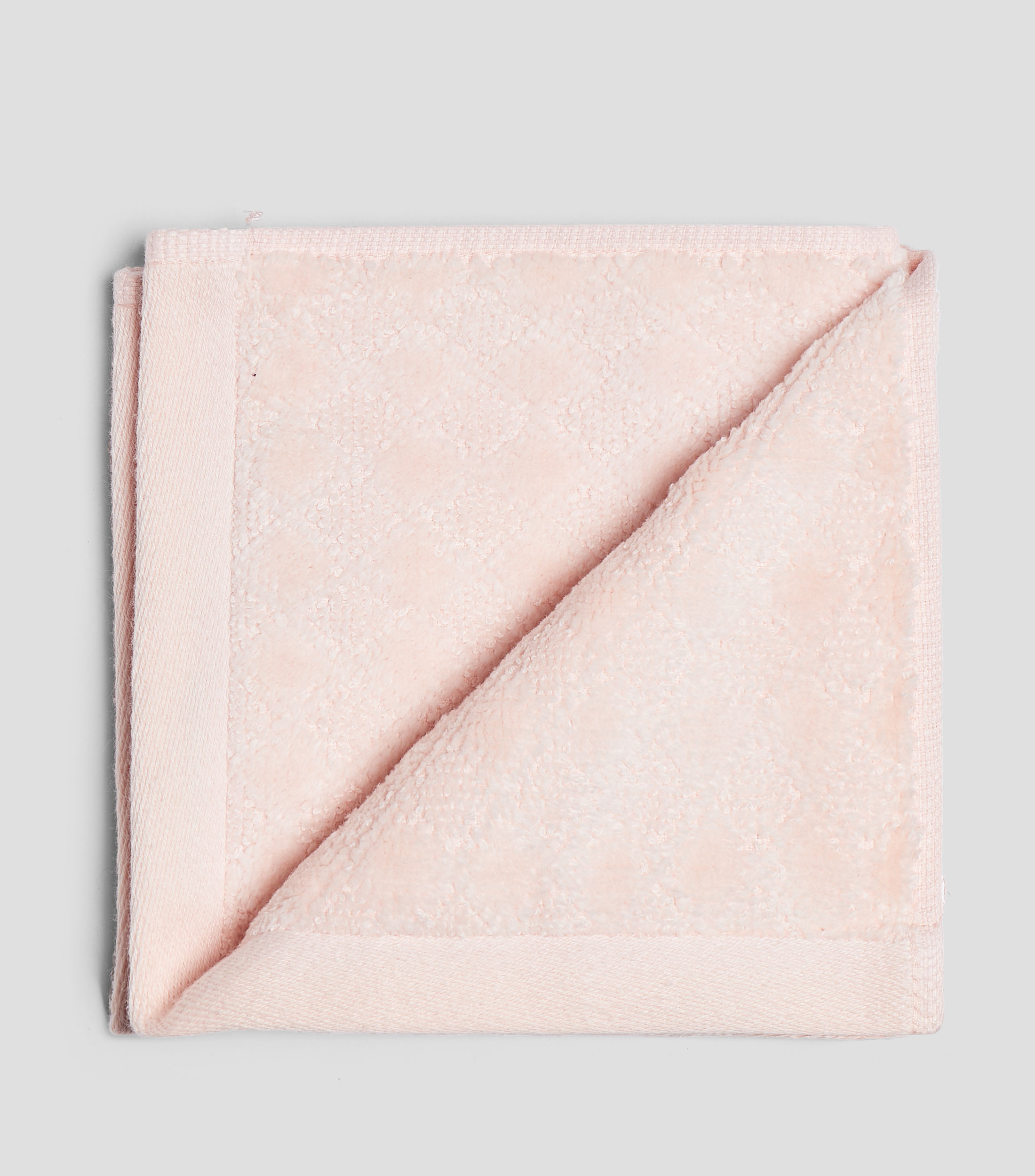Toalla facial rosa