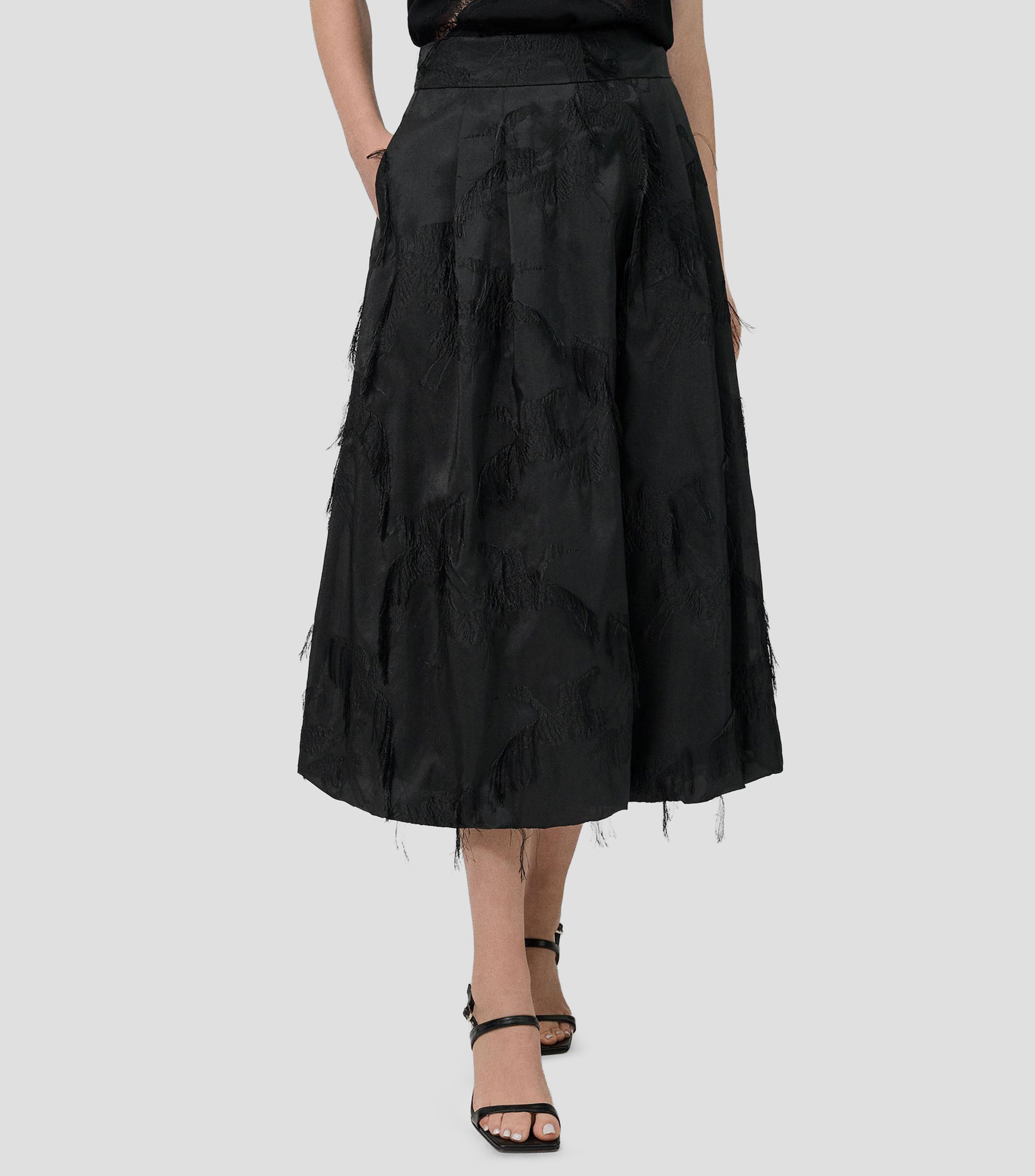 Falda midi de corte evasé jacquard Mujer