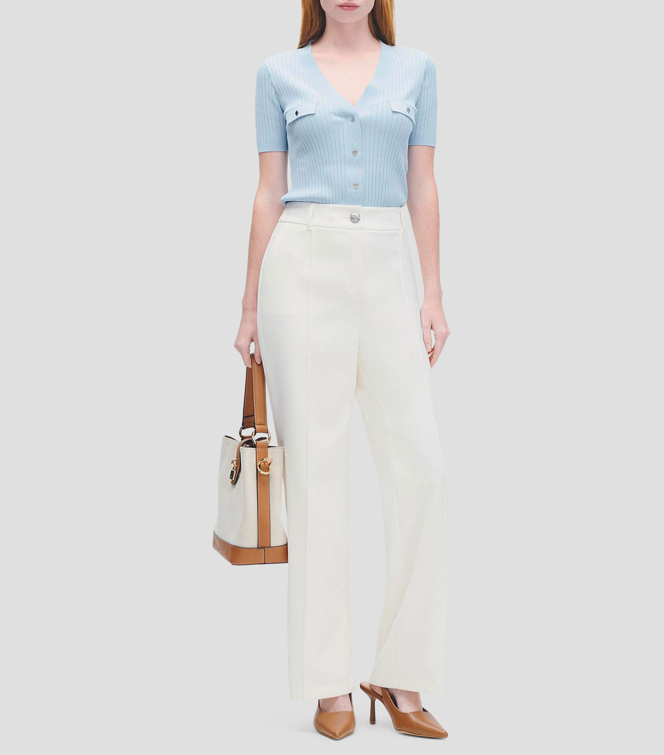 Blusa tejido canalé escote V aletilla y bolsillos simulados Mujer