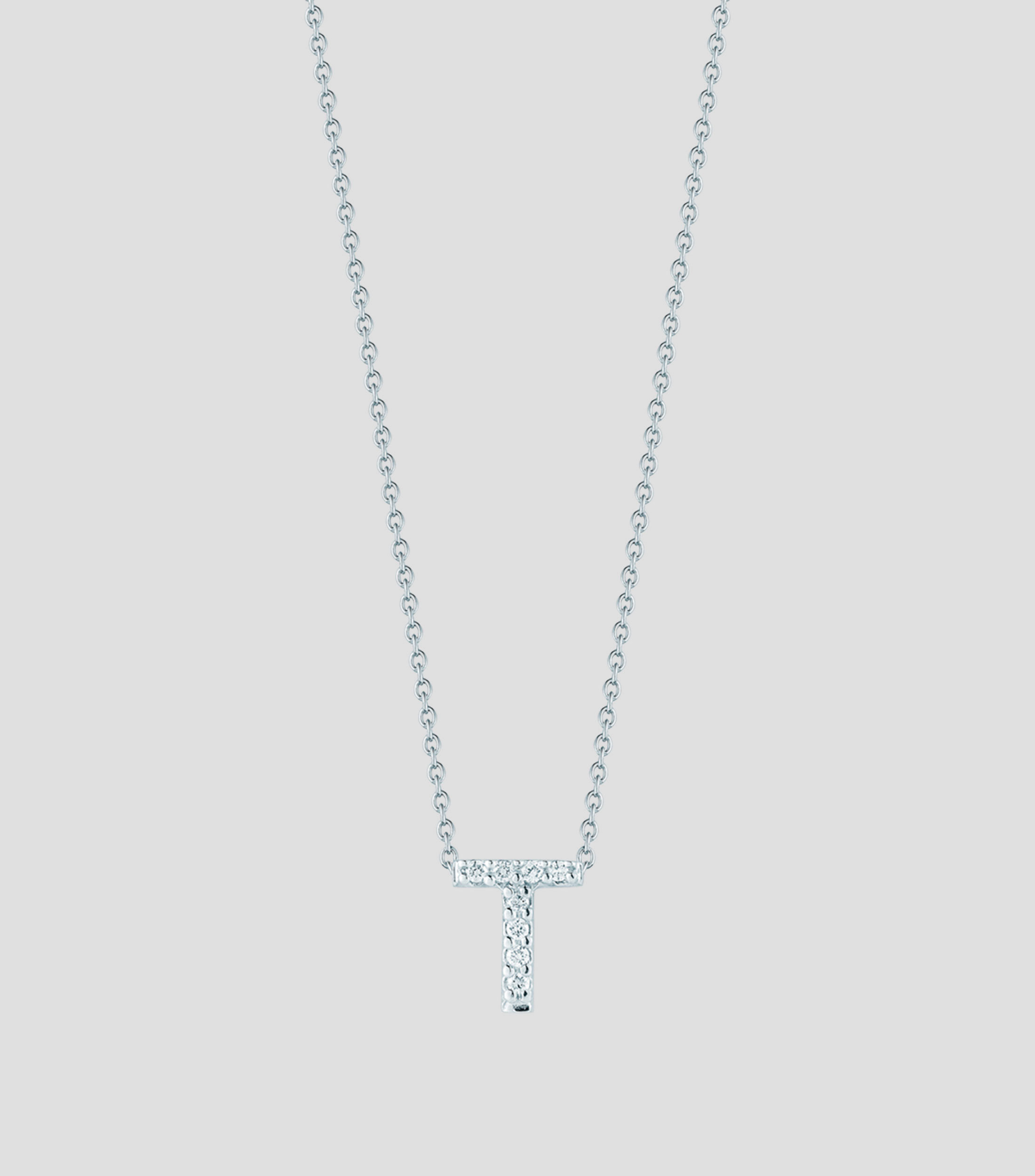 Collar en oro blanco 18 Kilates letra T con diamantes Mujer